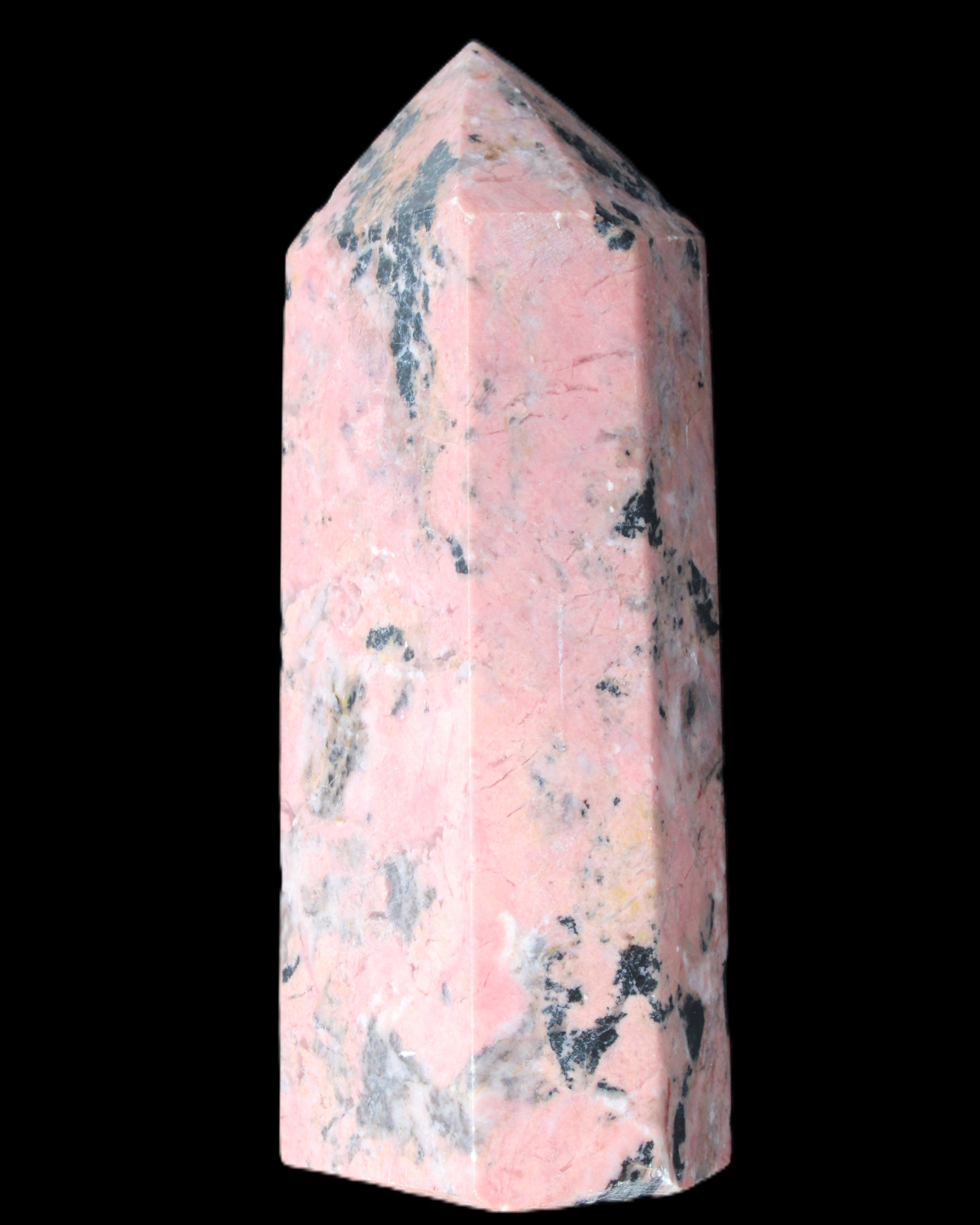 Peach Blossom Stone Rhodonite obelisk 505g in sunlight - Rocks and Things Store