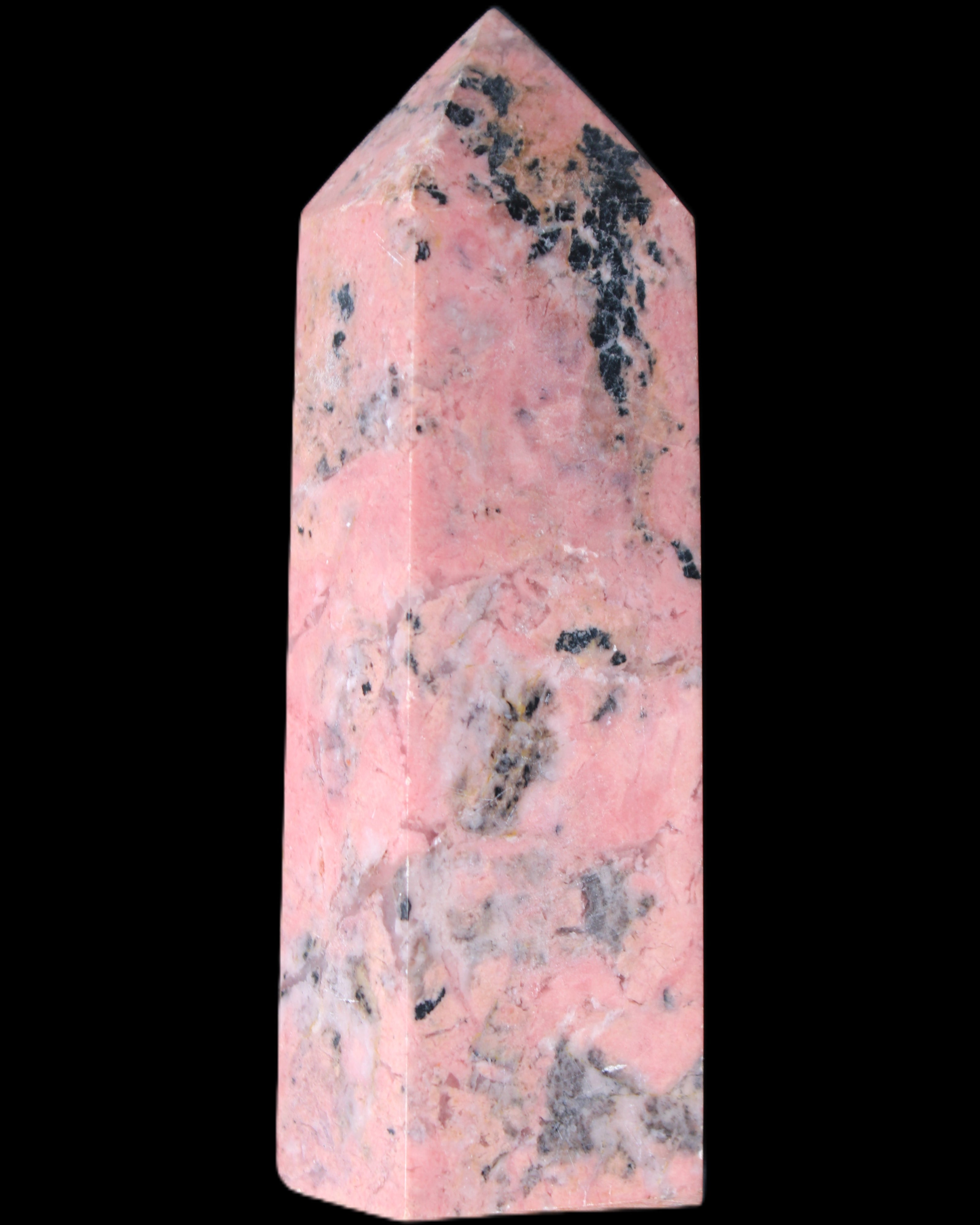 Peach Blossom Stone Rhodonite obelisk 505g in sunlight - Rocks and Things Store