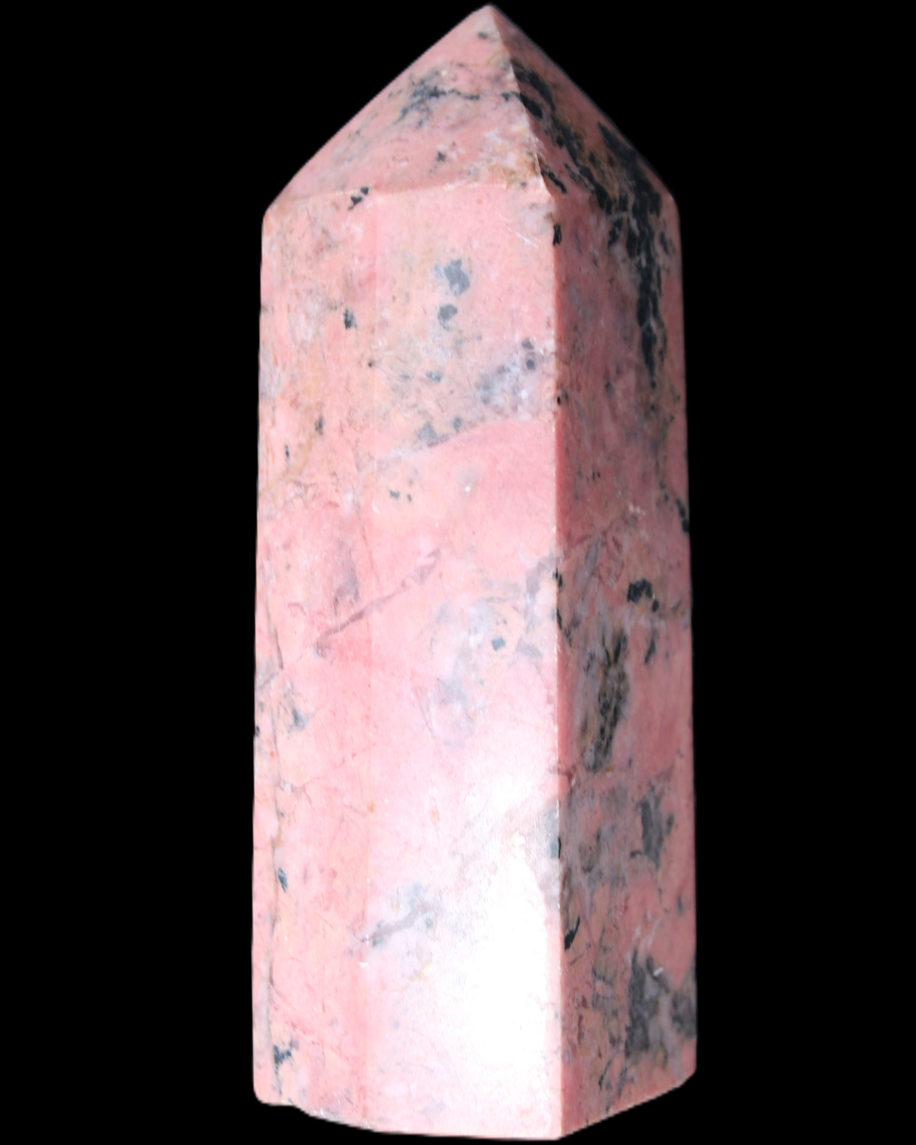 Peach Blossom Stone Rhodonite obelisk 505g in sunlight - Rocks and Things Store