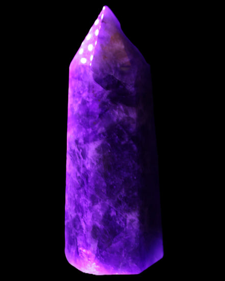 Amethyst obelisk 830g in UV light - Rocks and Things Store
