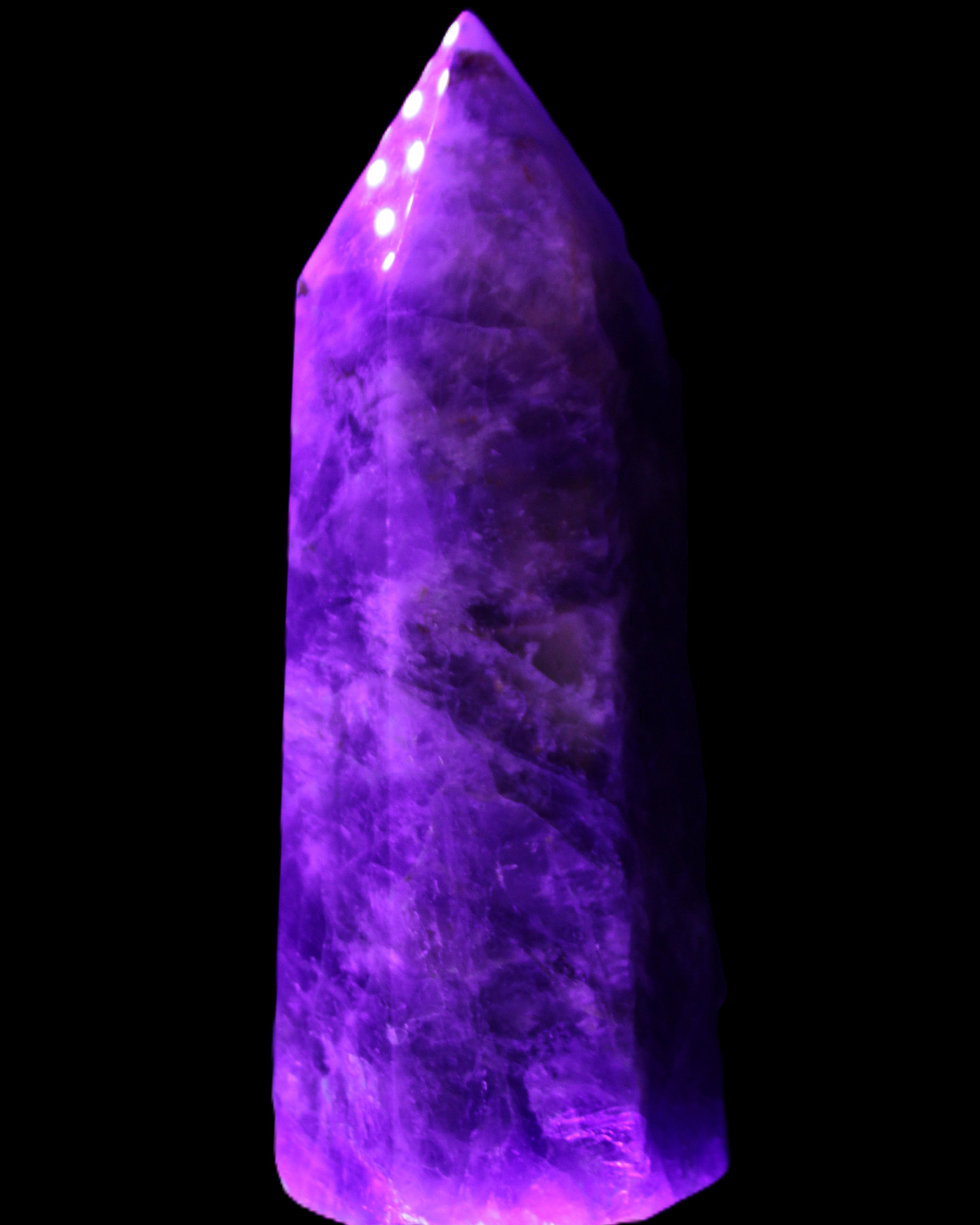 Amethyst obelisk 830g in UV light - Rocks and Things Store