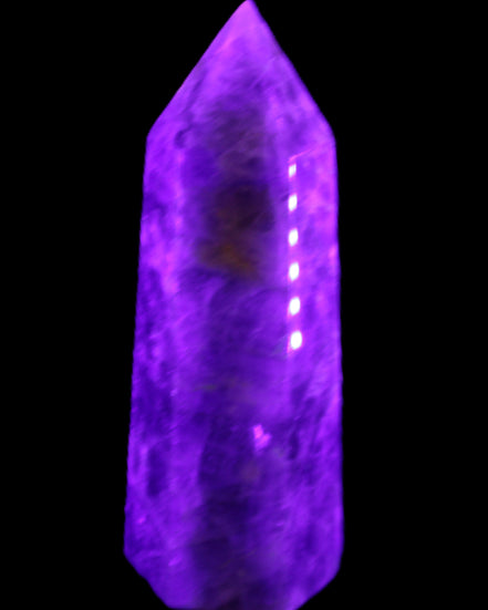 Amethyst obelisk 830g in UV light - Rocks and Things Store