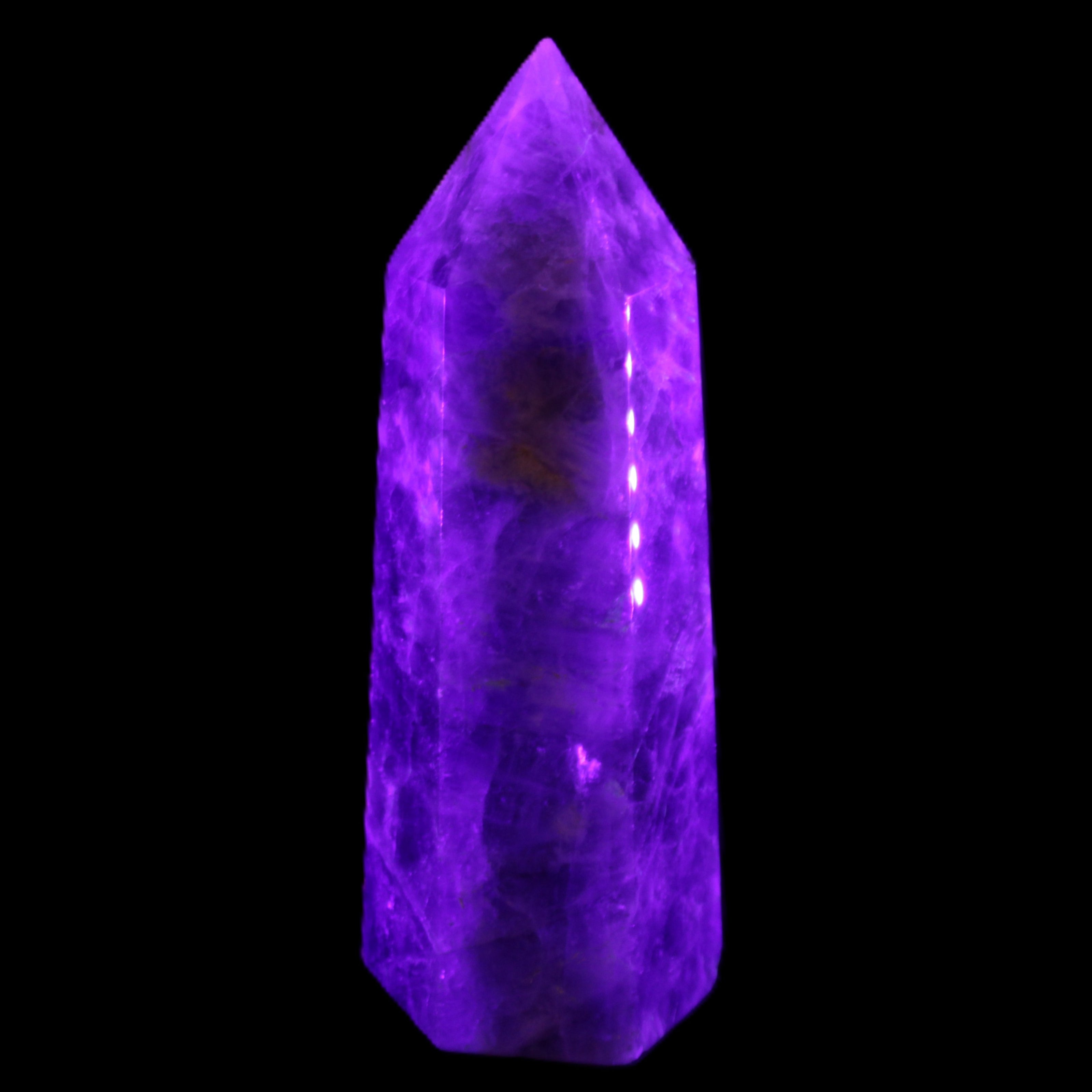 Amethyst obelisk 830g in UV light - Rocks and Things Store