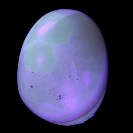 Yellow Banded Calcite egg 118g in UV light - Rocks and Things Store