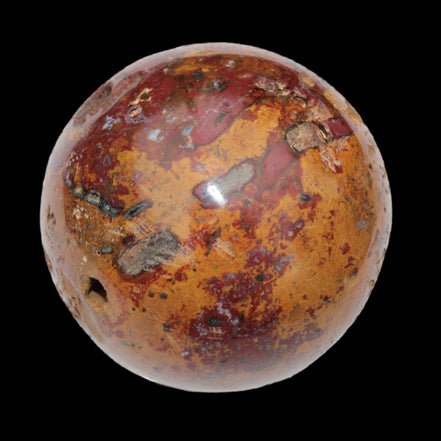 Teardrop Jasper sphere 313g in sunlight - Rocks and Things Store
