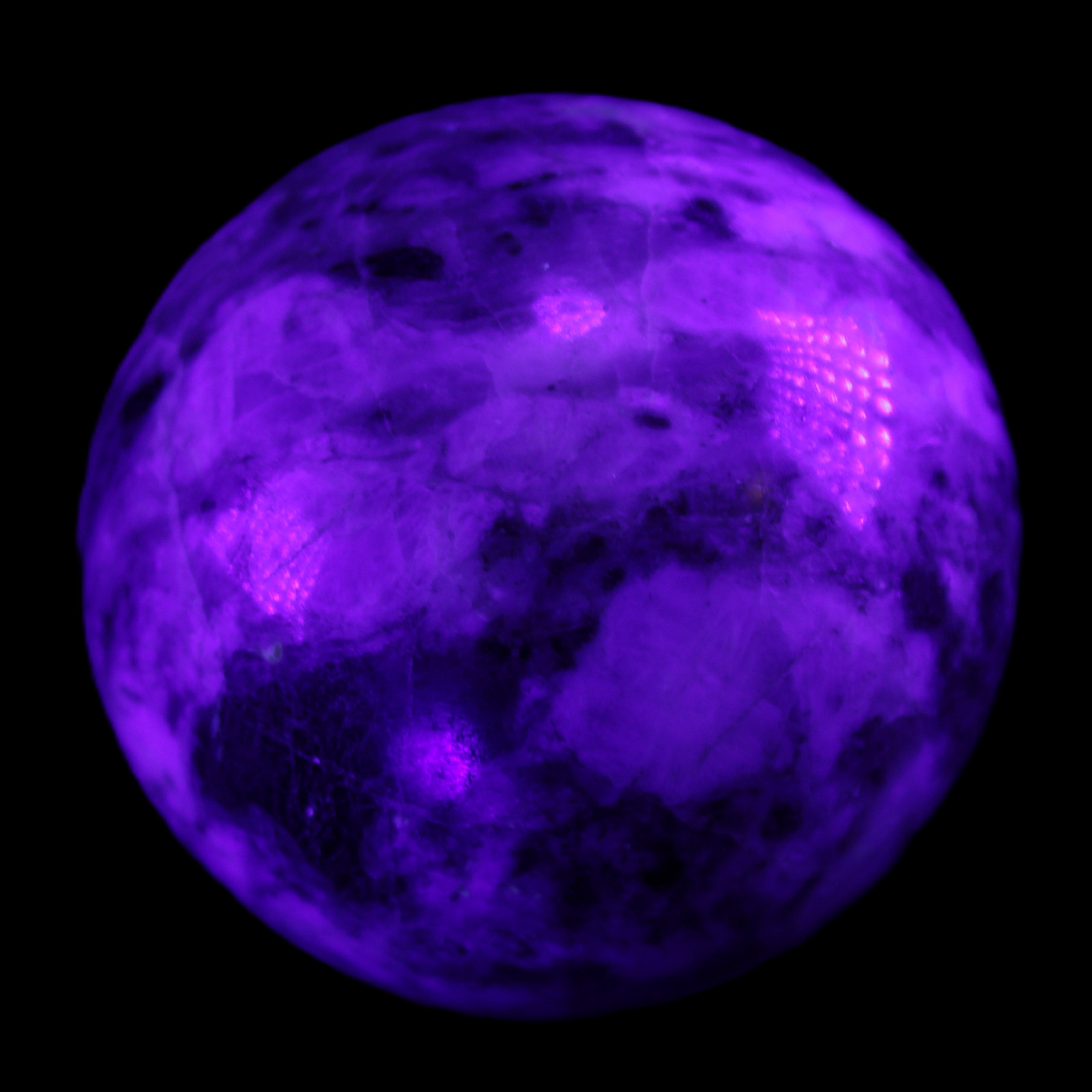 Pink Tourmaline sphere 60mm 357g in UV light - Rocks and Things Store