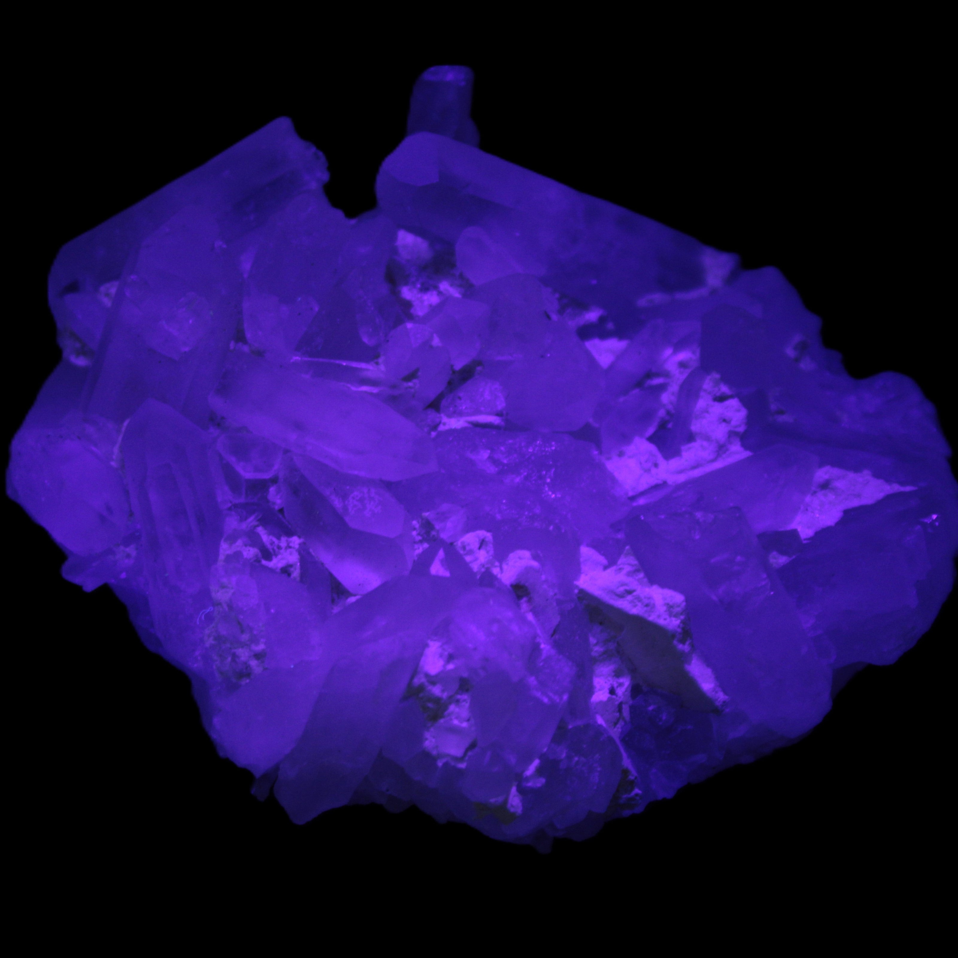 Clear Quartz cluster 100*77*33mm 242g in UV light - Rocks and Things Store