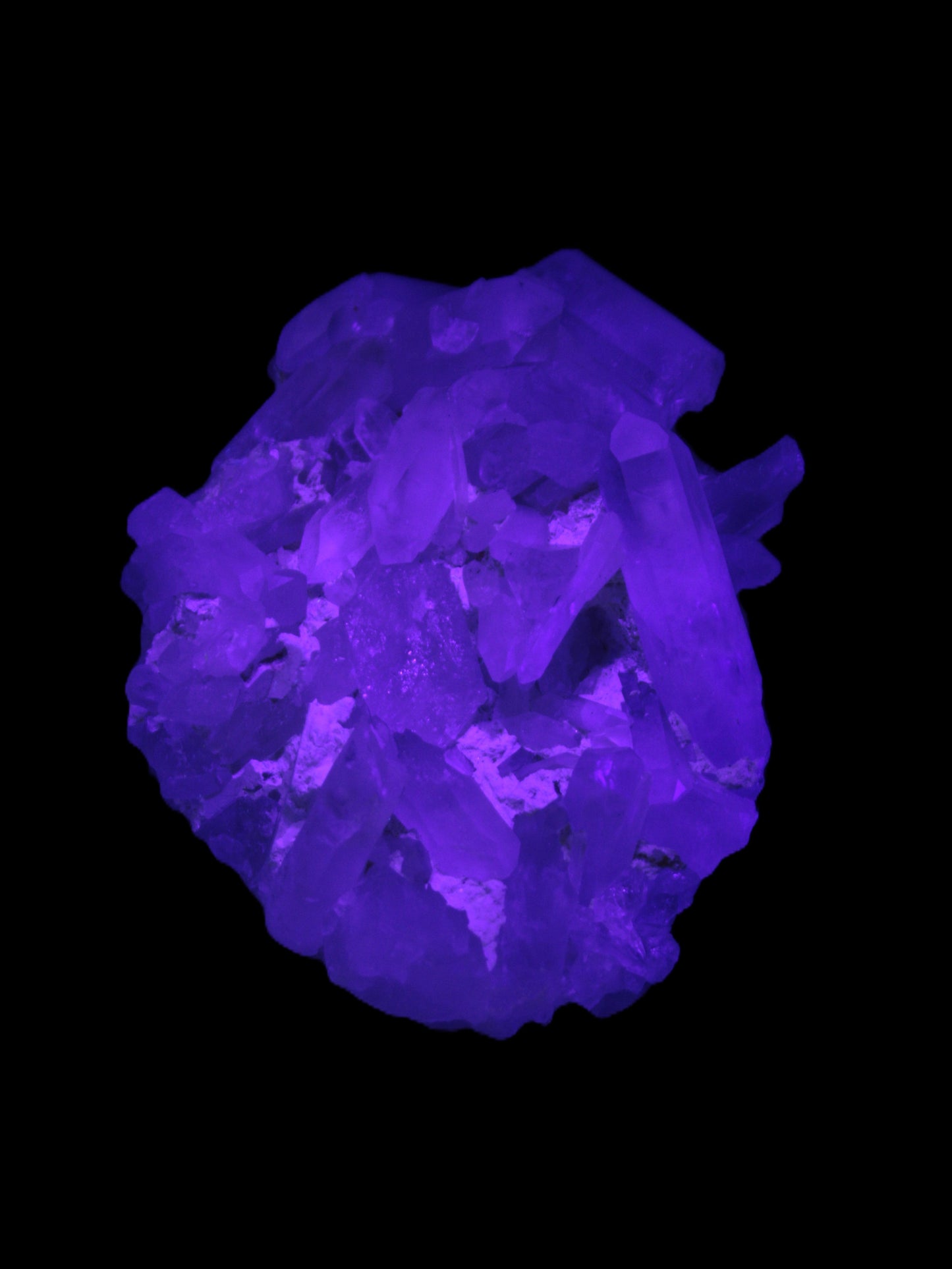 Clear Quartz cluster 100*77*33mm 242g in UV light - Rocks and Things Store