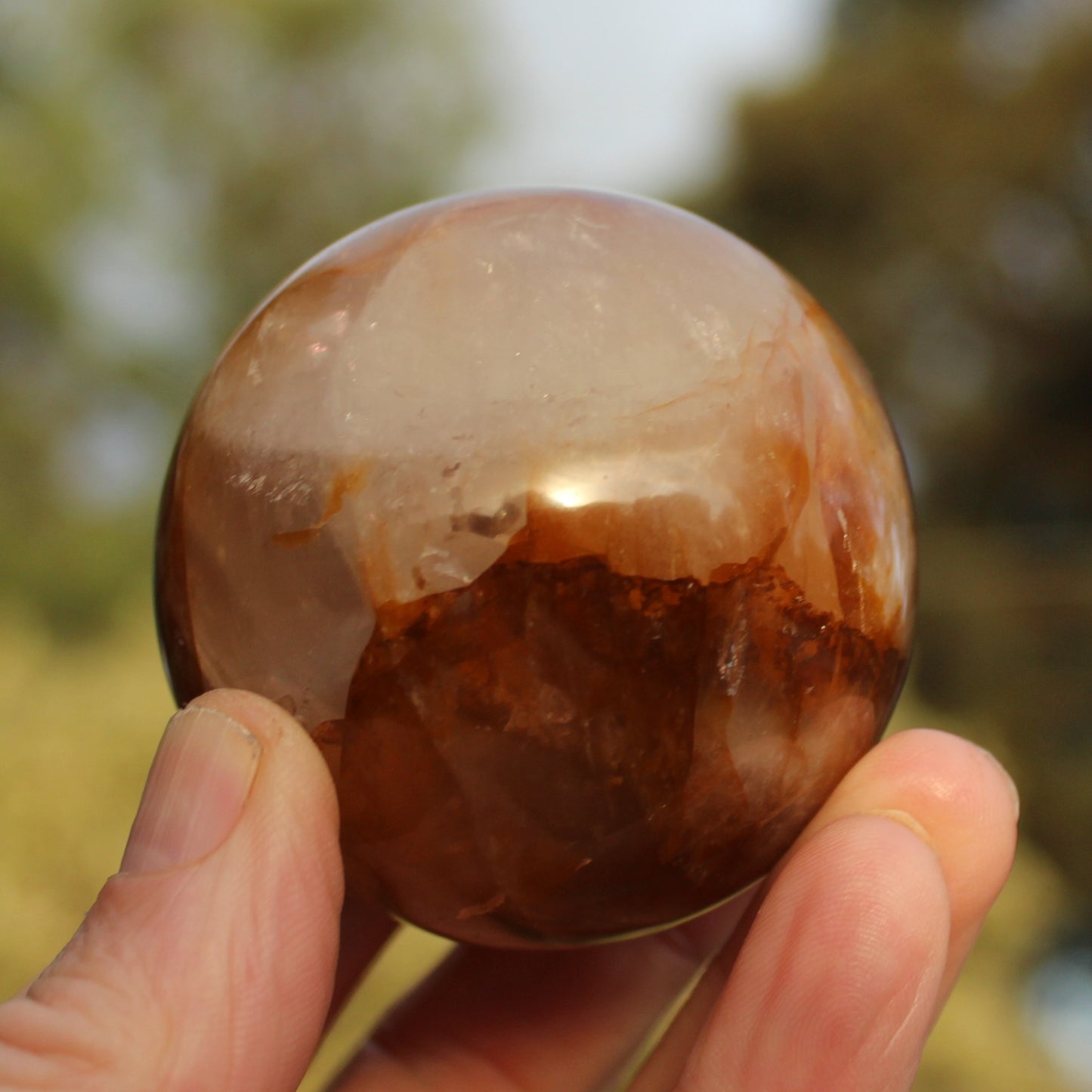 Hematoid Yellow Fire quartz sphere 298g Rocks and Things