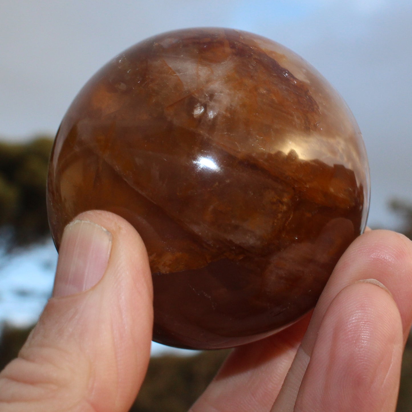 Hematoid Yellow Fire quartz sphere 298g Rocks and Things