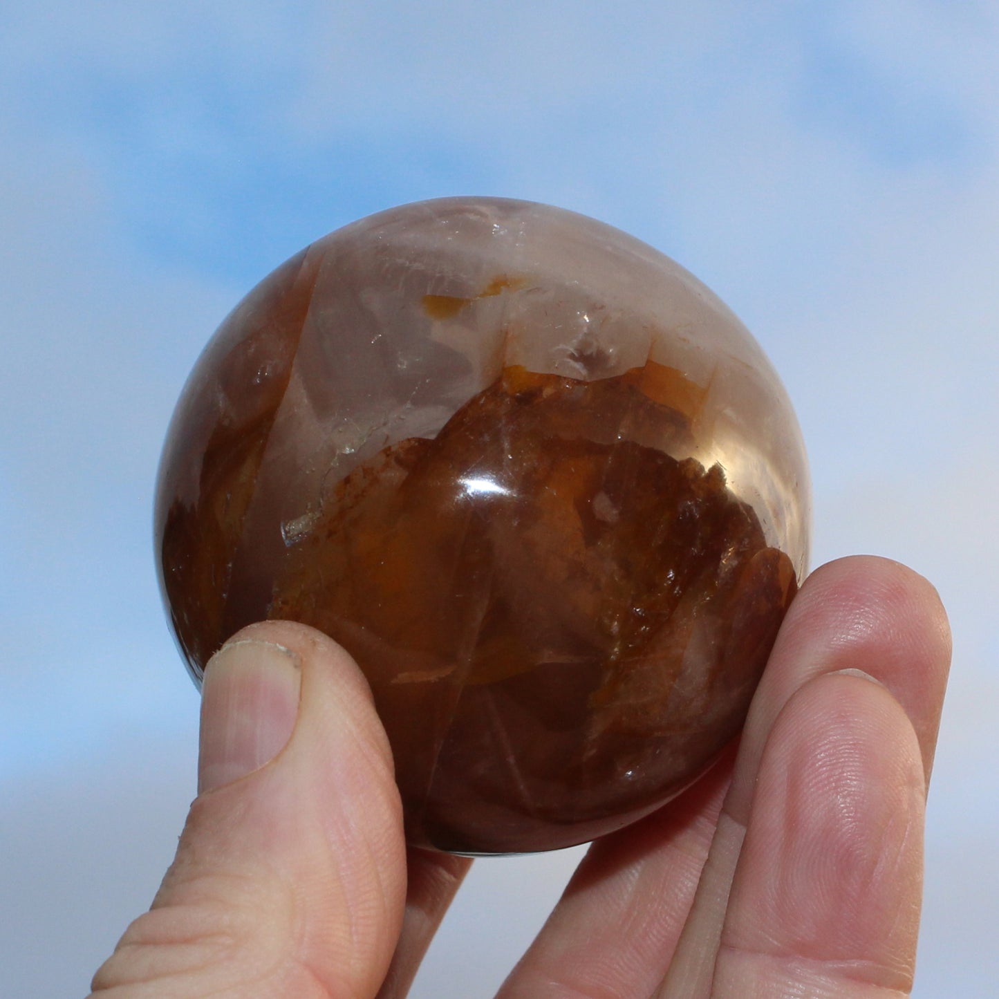Hematoid Yellow Fire quartz sphere 298g Rocks and Things