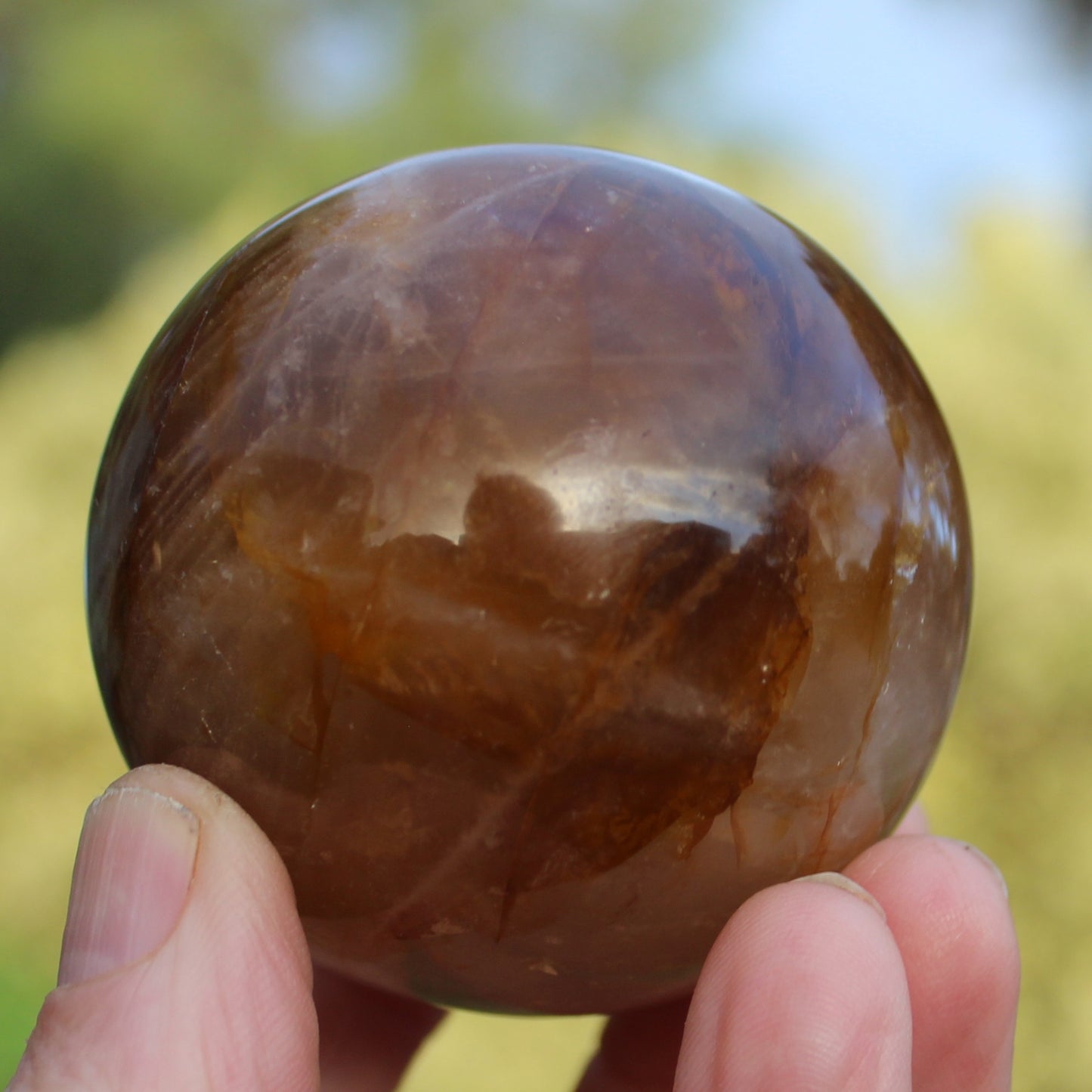 Hematoid Yellow Fire quartz sphere 298g Rocks and Things