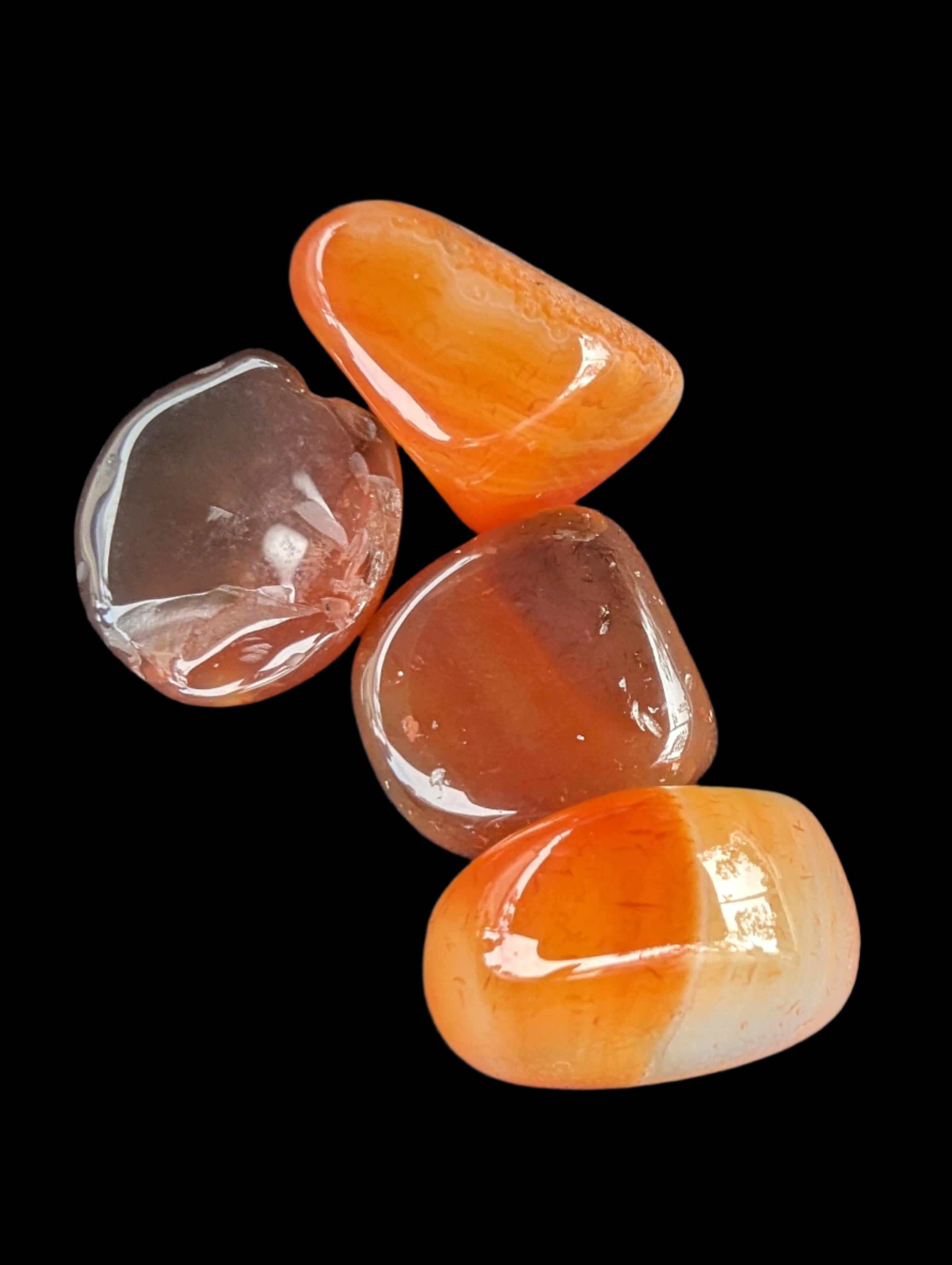 Red Agate 3/4 tumbled tiny stones 7-10g in sunlight - Rocks and Things Store