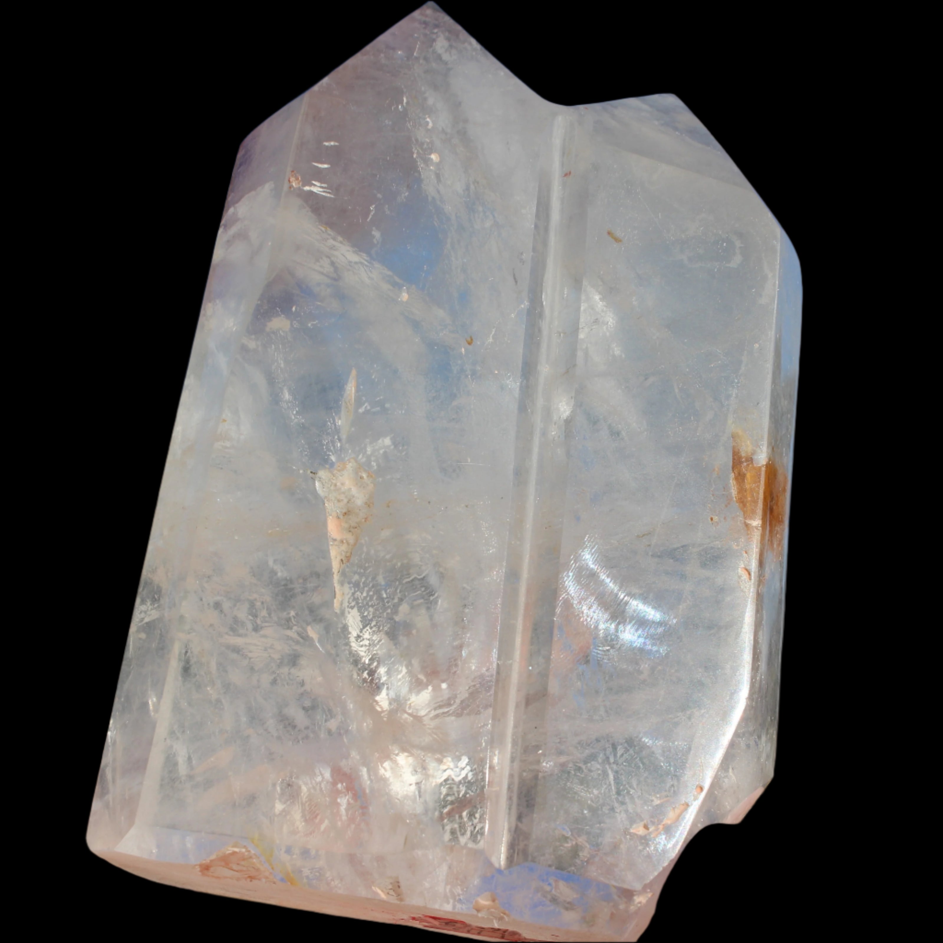 Clear Quartz double-pillar obelisk 1655g in sunshine, held in hand