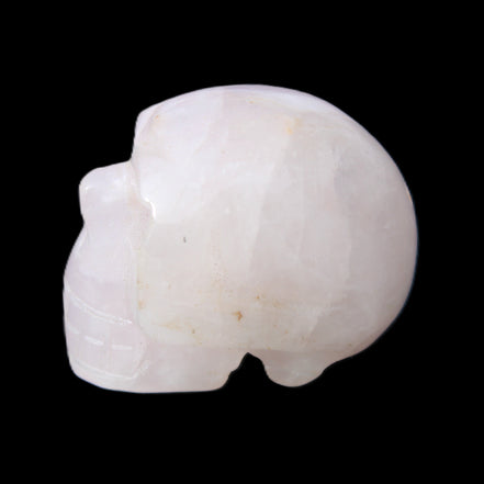 Rose Quartz hand-carved skull 51g in sunlight - Rocks and Things Store