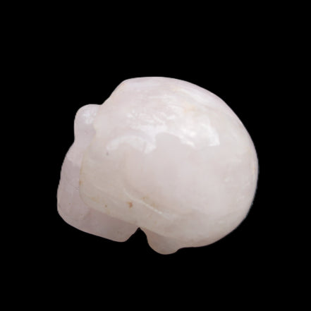 Rose Quartz hand-carved skull 51g in sunlight - Rocks and Things Store