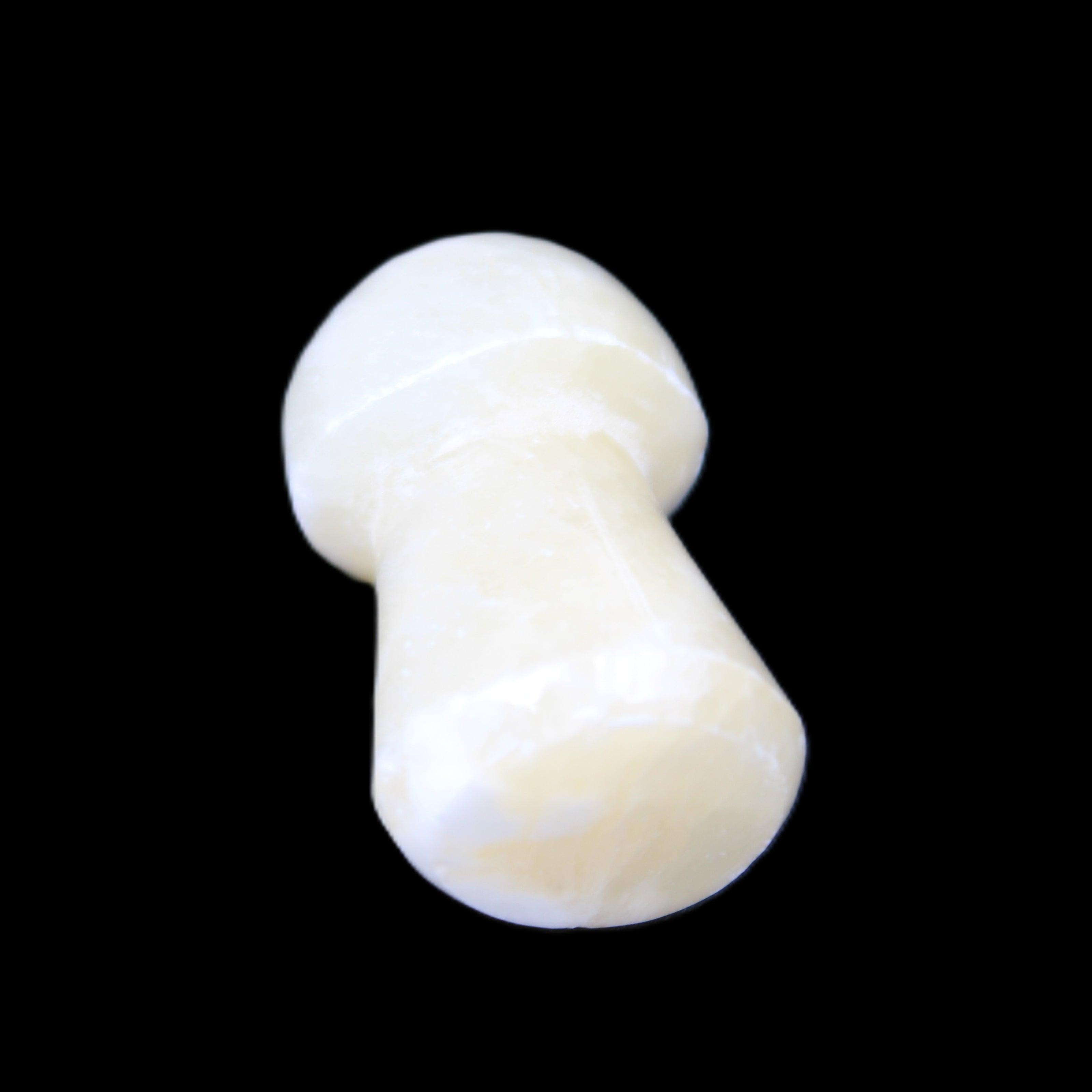 Rose Quartz hand-carved skull 51g in sunlight - Rocks and Things Store