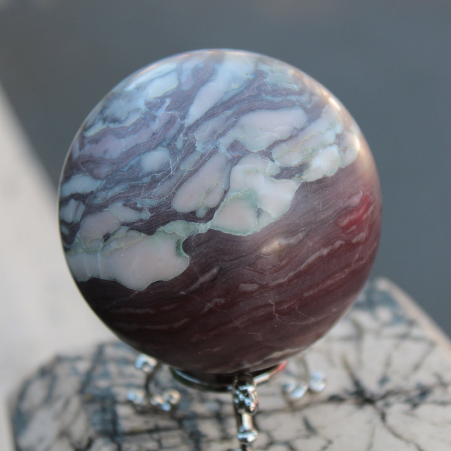 Zebra Stone Jasper sphere 569g Rocks and Things
