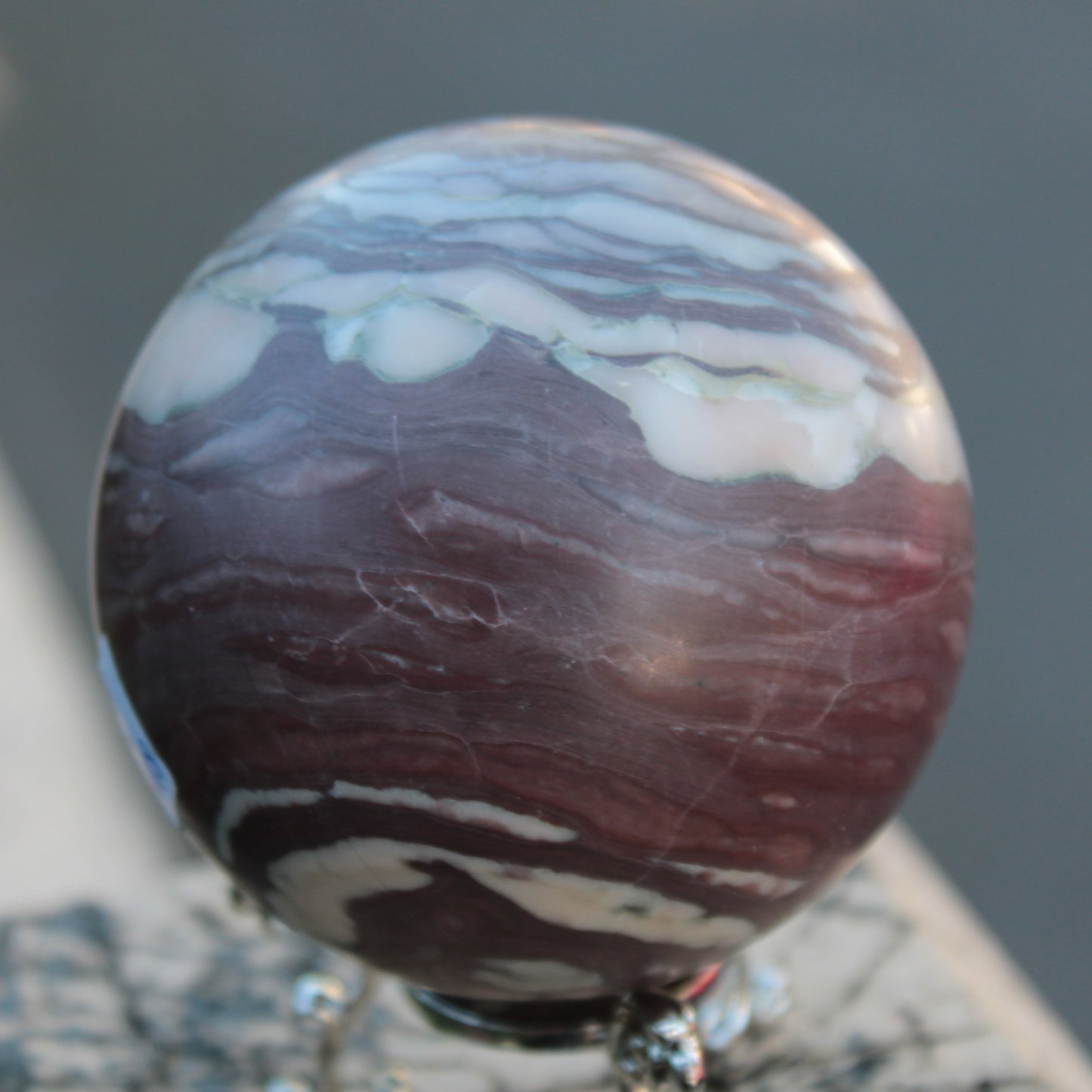 Zebra Stone Jasper sphere 569g Rocks and Things