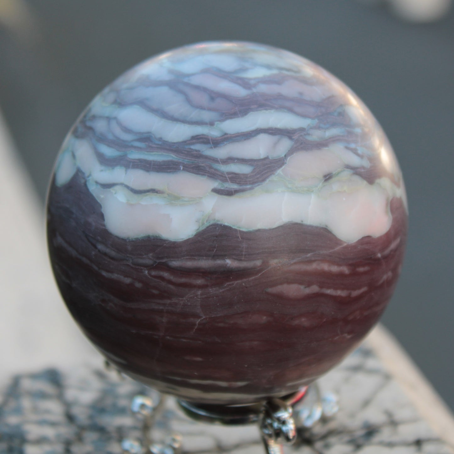 Zebra Stone Jasper sphere 569g Rocks and Things