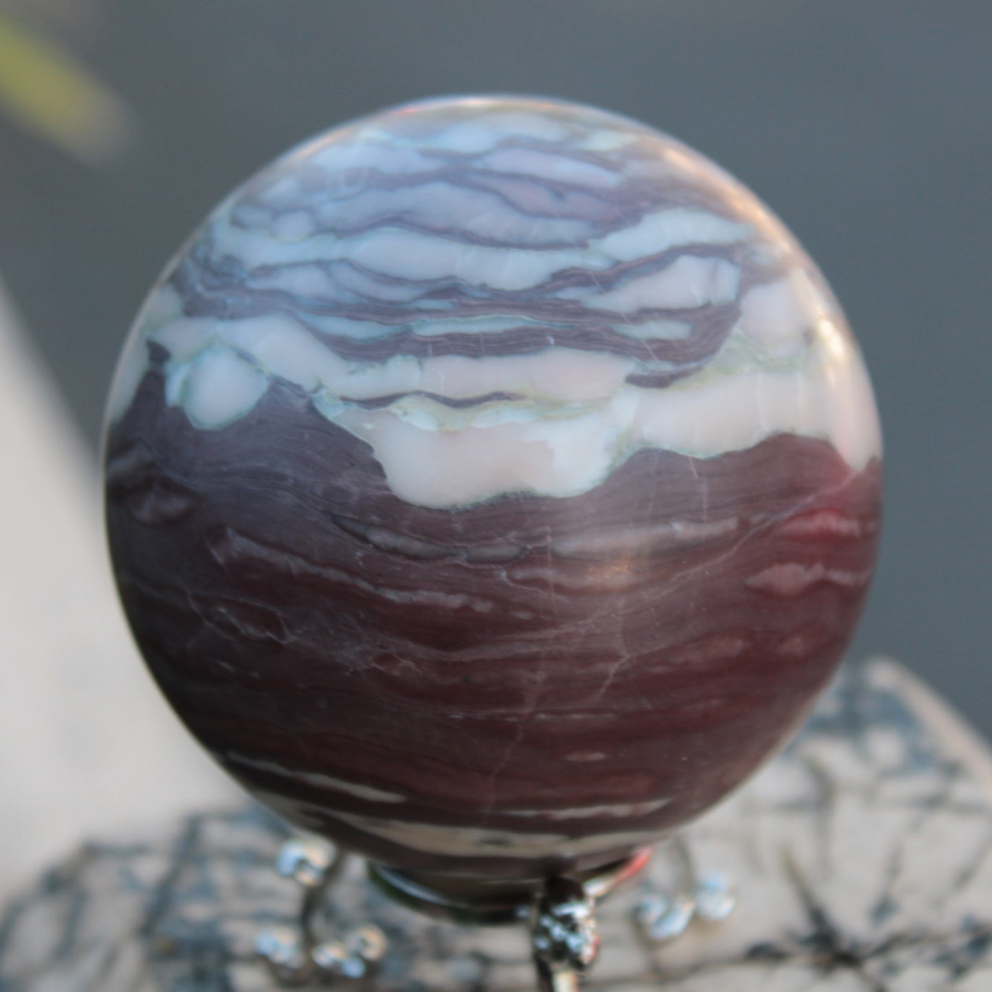 Zebra Stone Jasper sphere 569g Rocks and Things