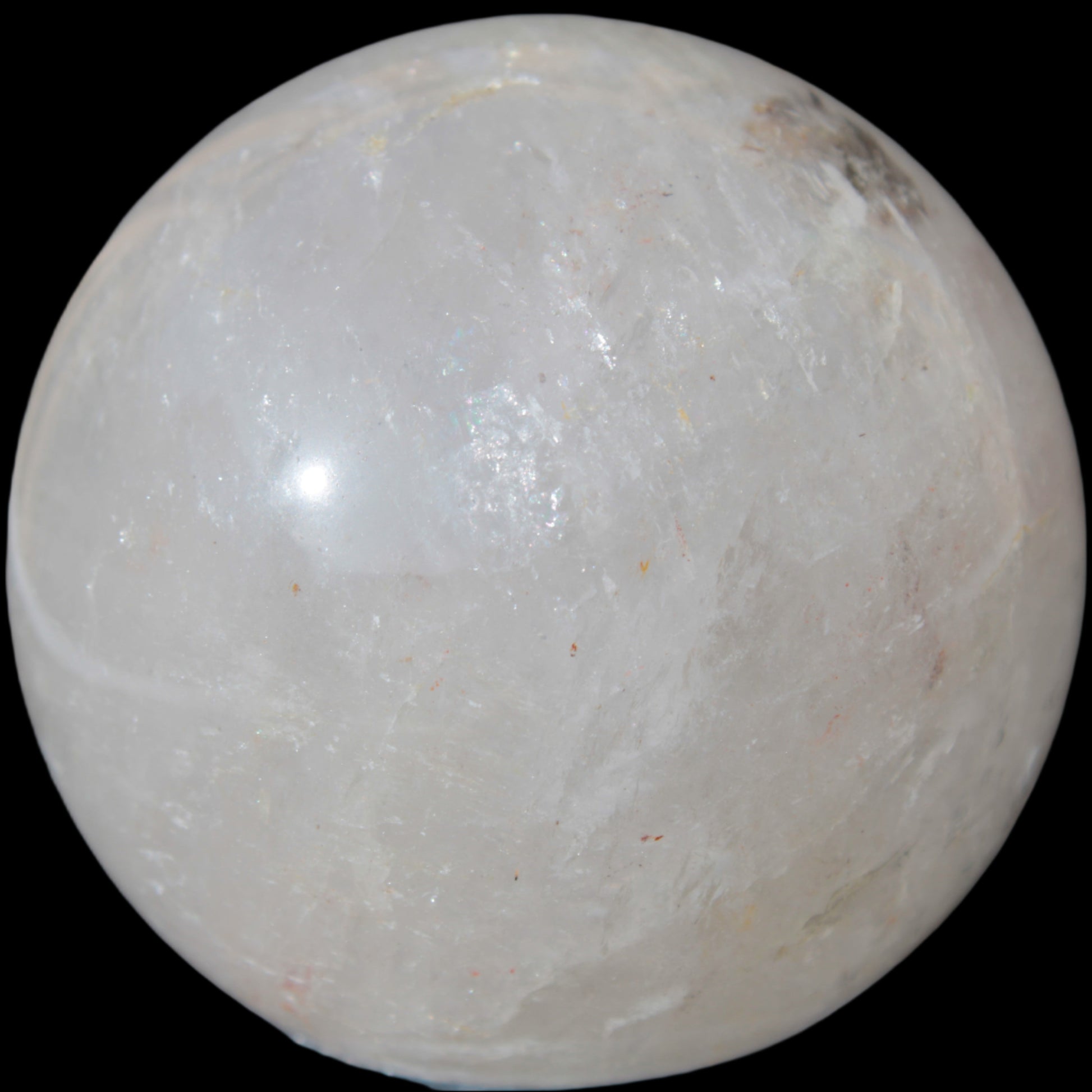 Clear Quartz sphere 70mm 475g in sunlight - Rocks and Things Store