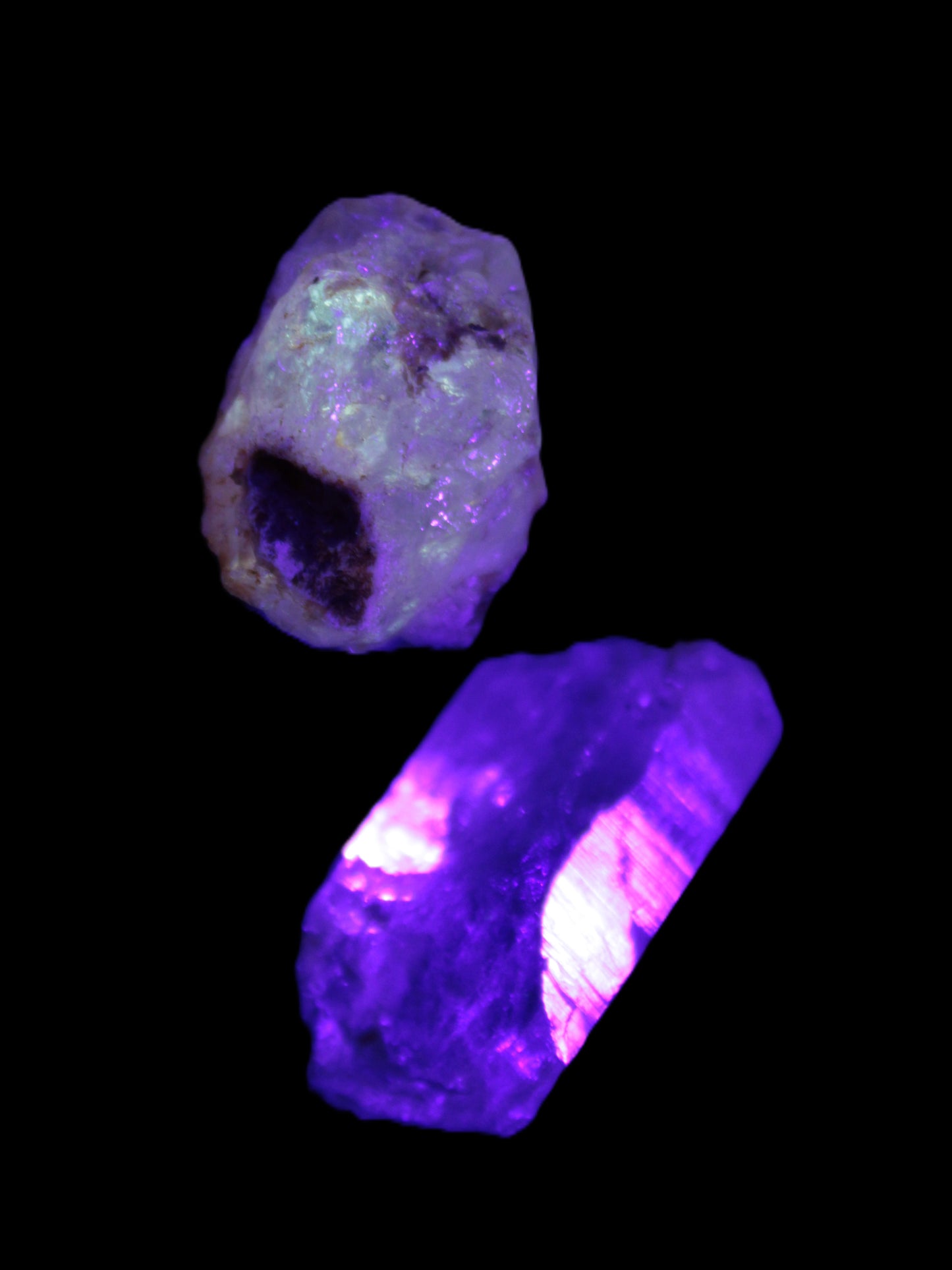 Two Fenster crystals 14.9g in UV light