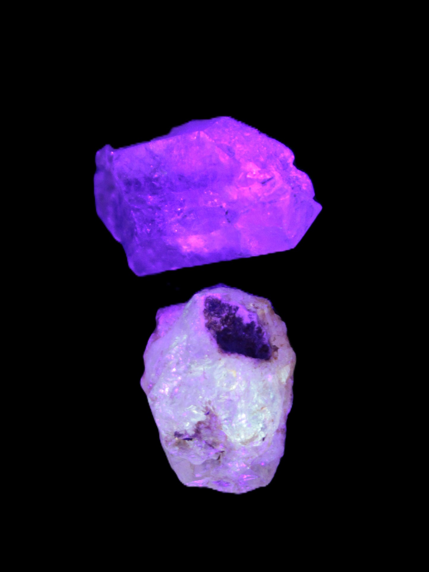 Two Fenster crystals 14.9g in UV light