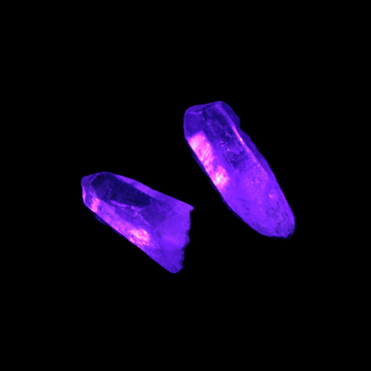 Two Fenster skeletal Enhydro crystals with hydrocarbons 4.8-8.6g