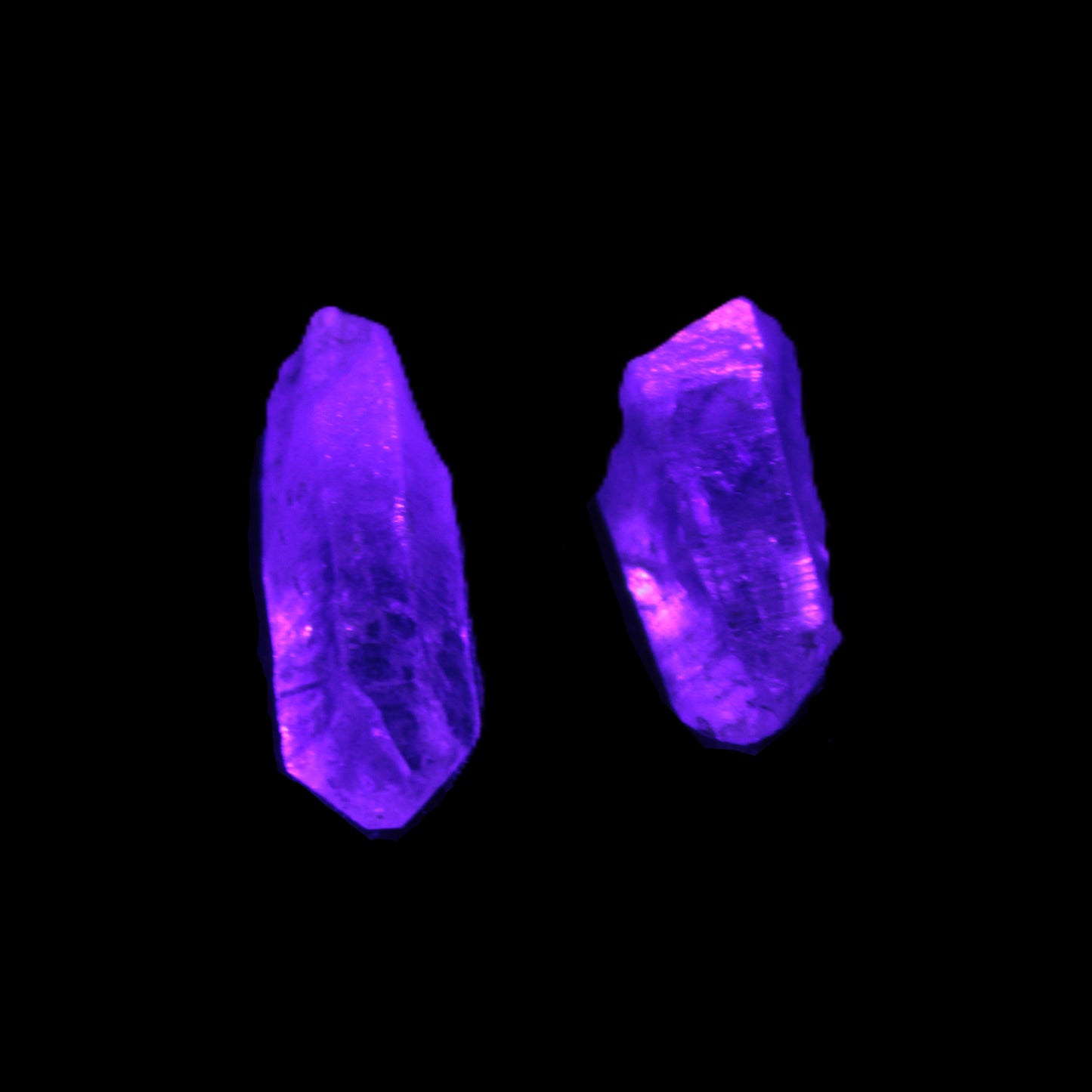 Two Fenster skeletal Enhydro crystals with hydrocarbons 4.8-8.6g