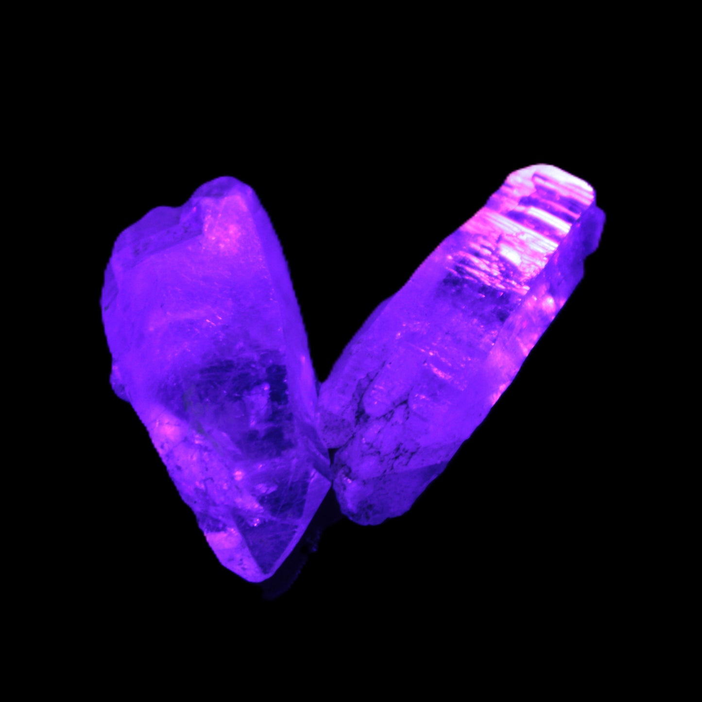 Two Fenster skeletal Enhydro crystals with hydrocarbons 4.8-8.6g