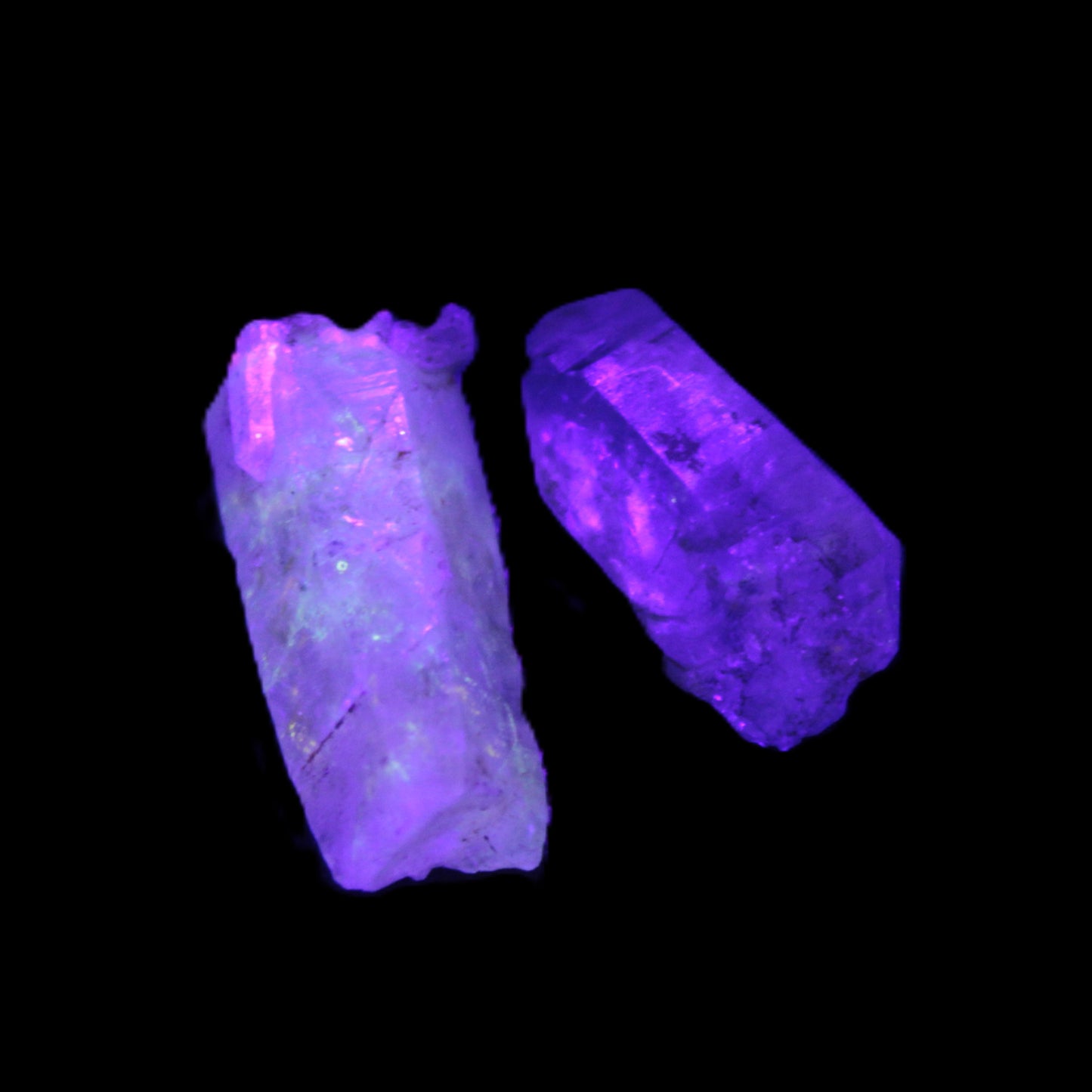 Two Fenster skeletal Enhydro crystals with hydrocarbons 4.8-8.6g