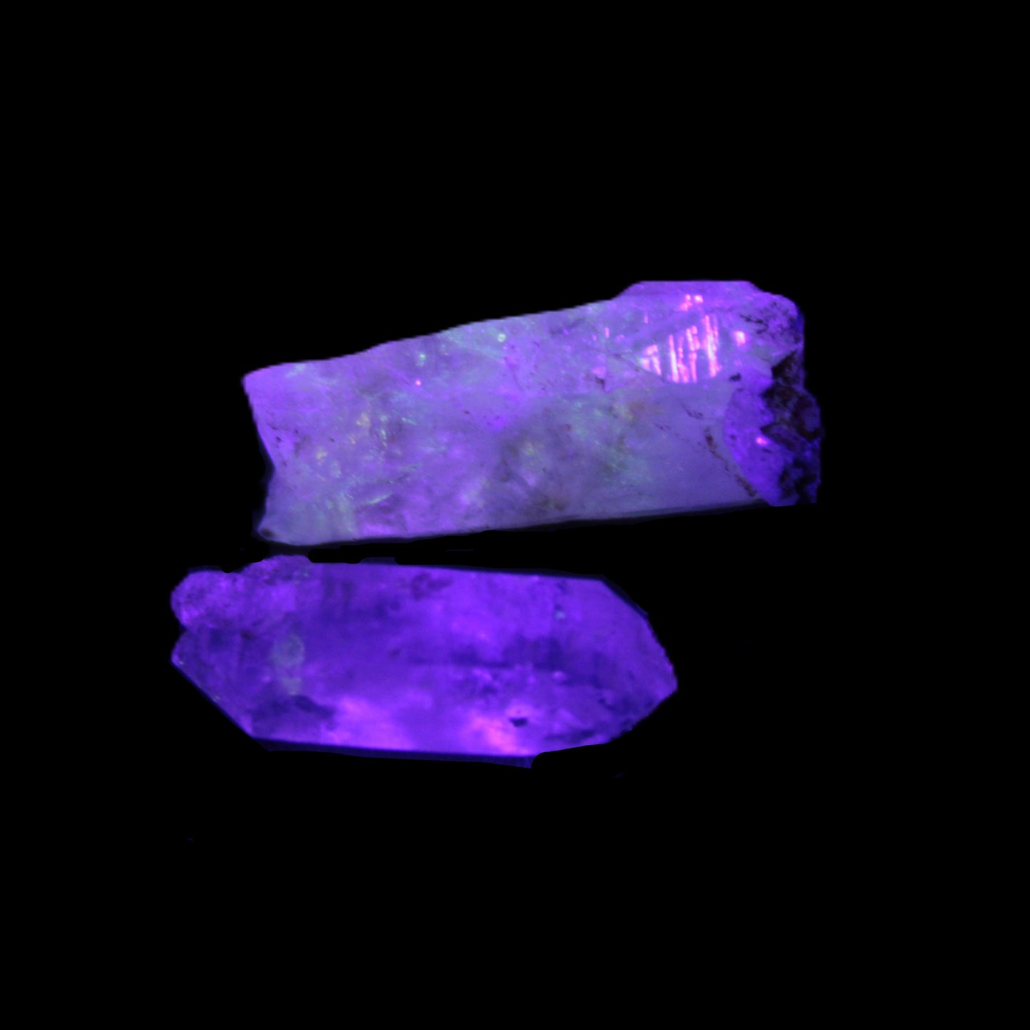 Two Fenster skeletal Enhydro crystals with hydrocarbons 4.8-8.6g