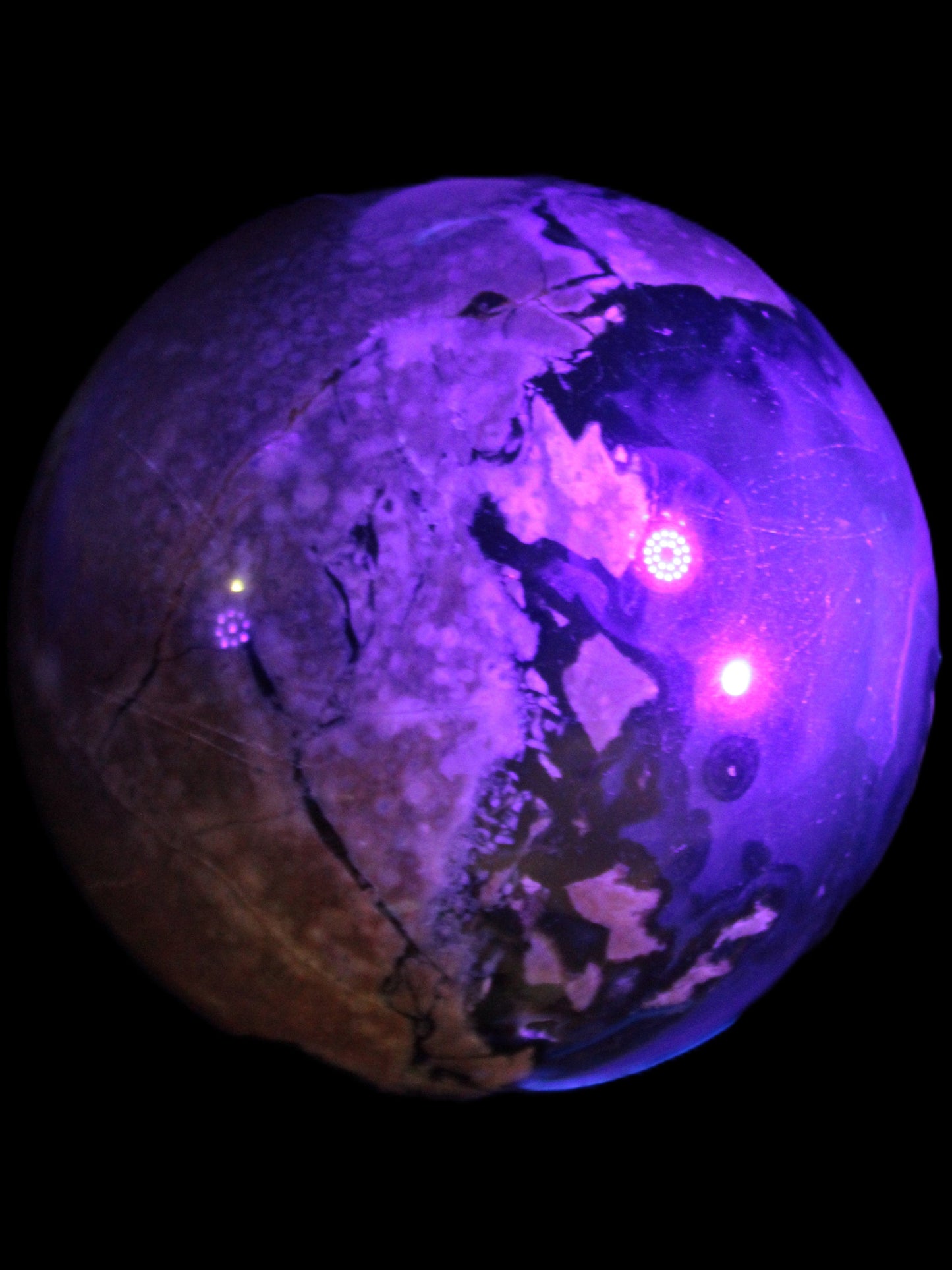 Volcano Agate sphere 119mm 2167g in UV light - Rocks and Things Store