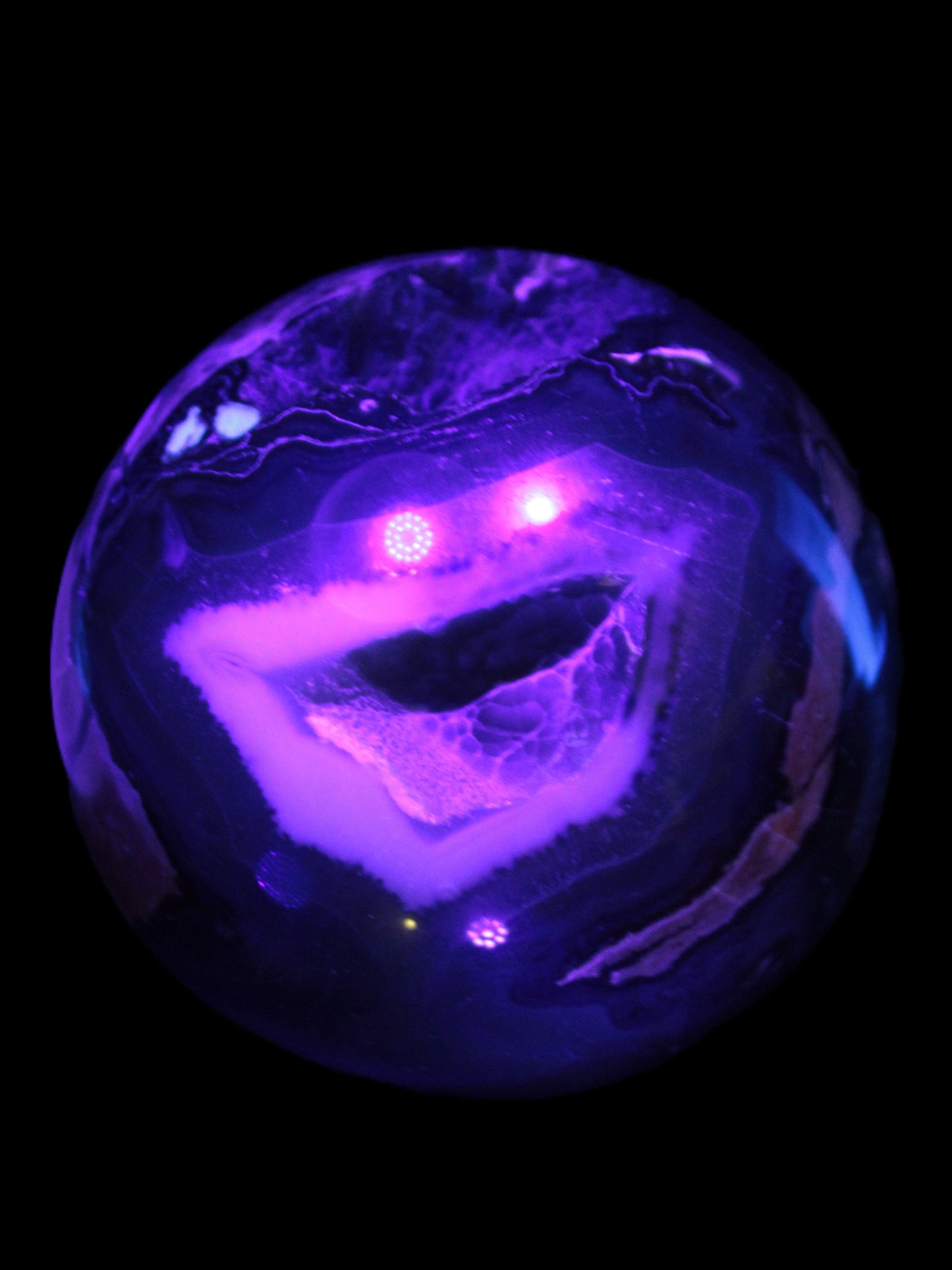 Volcano Agate sphere 119mm 2167g in UV light - Rocks and Things Store