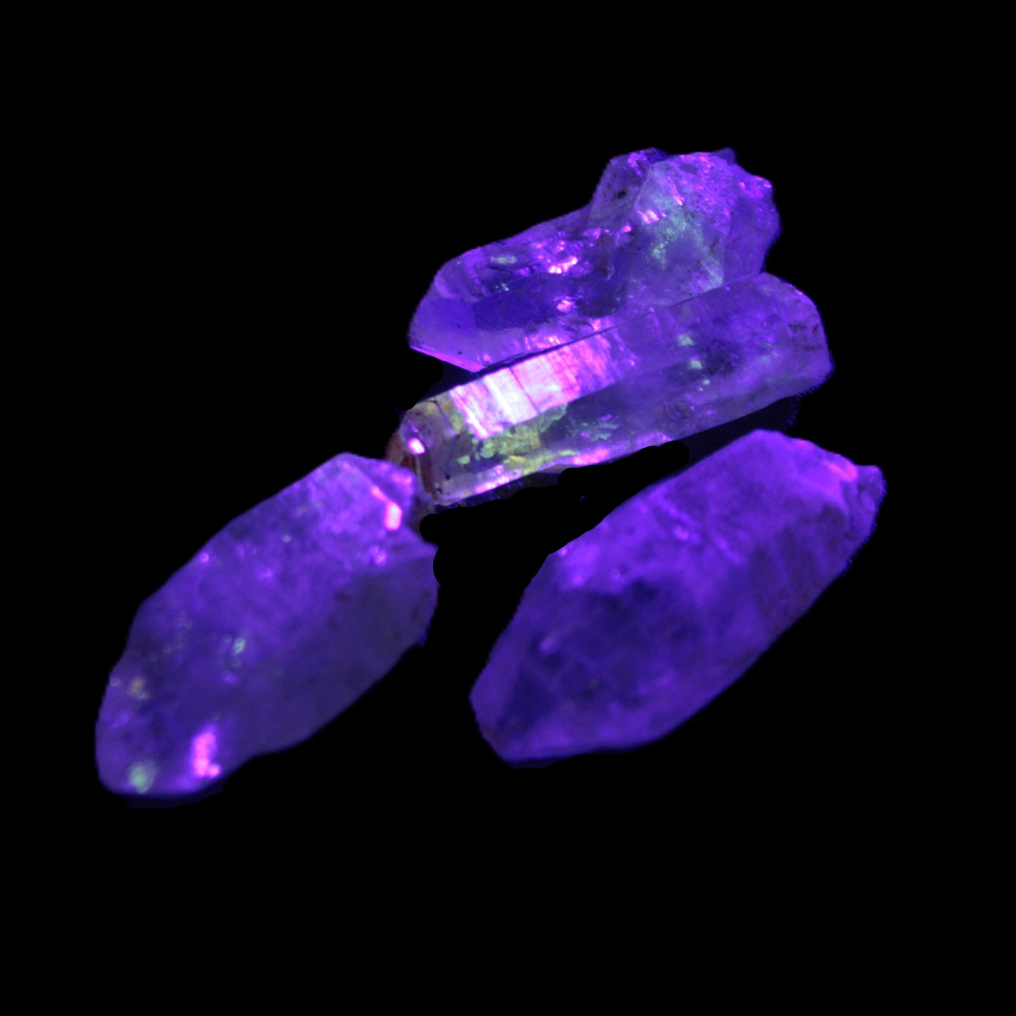 Fenster Enhydro Hydrocarbon 4 crystals 9-10g in UV light - Rocks and Things Store