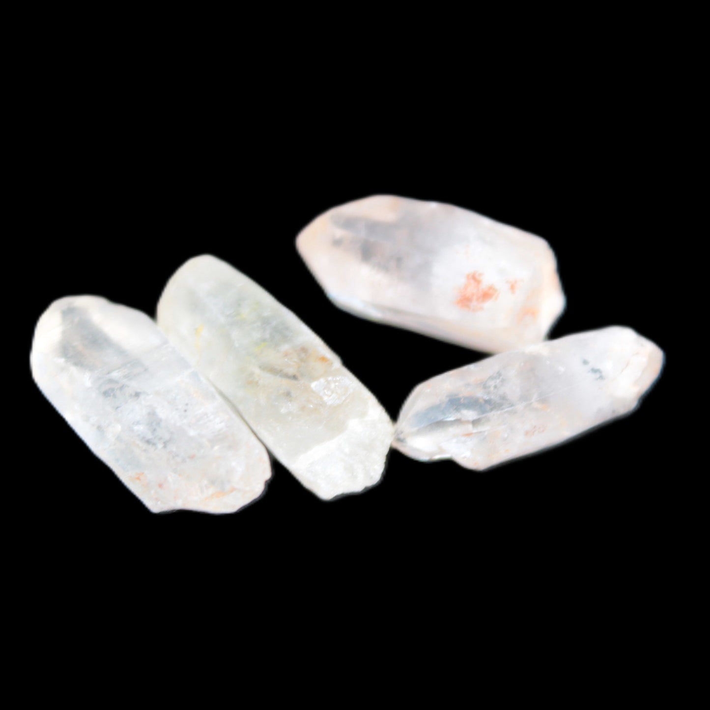 Fenster Enhydro Hydrocarbon 4 crystals 9-10g in sunlight - Rocks and Things Store