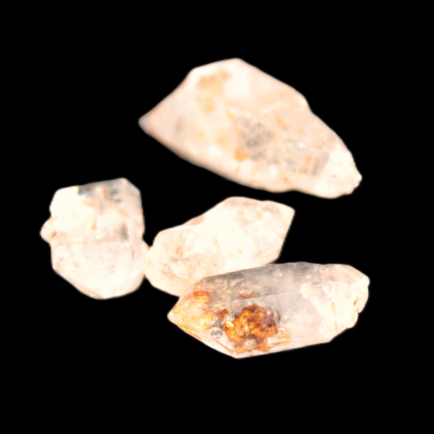 Fenster Enhydro Hydrocarbon 4 crystals 9-10g in sunlight - Rocks and Things Store