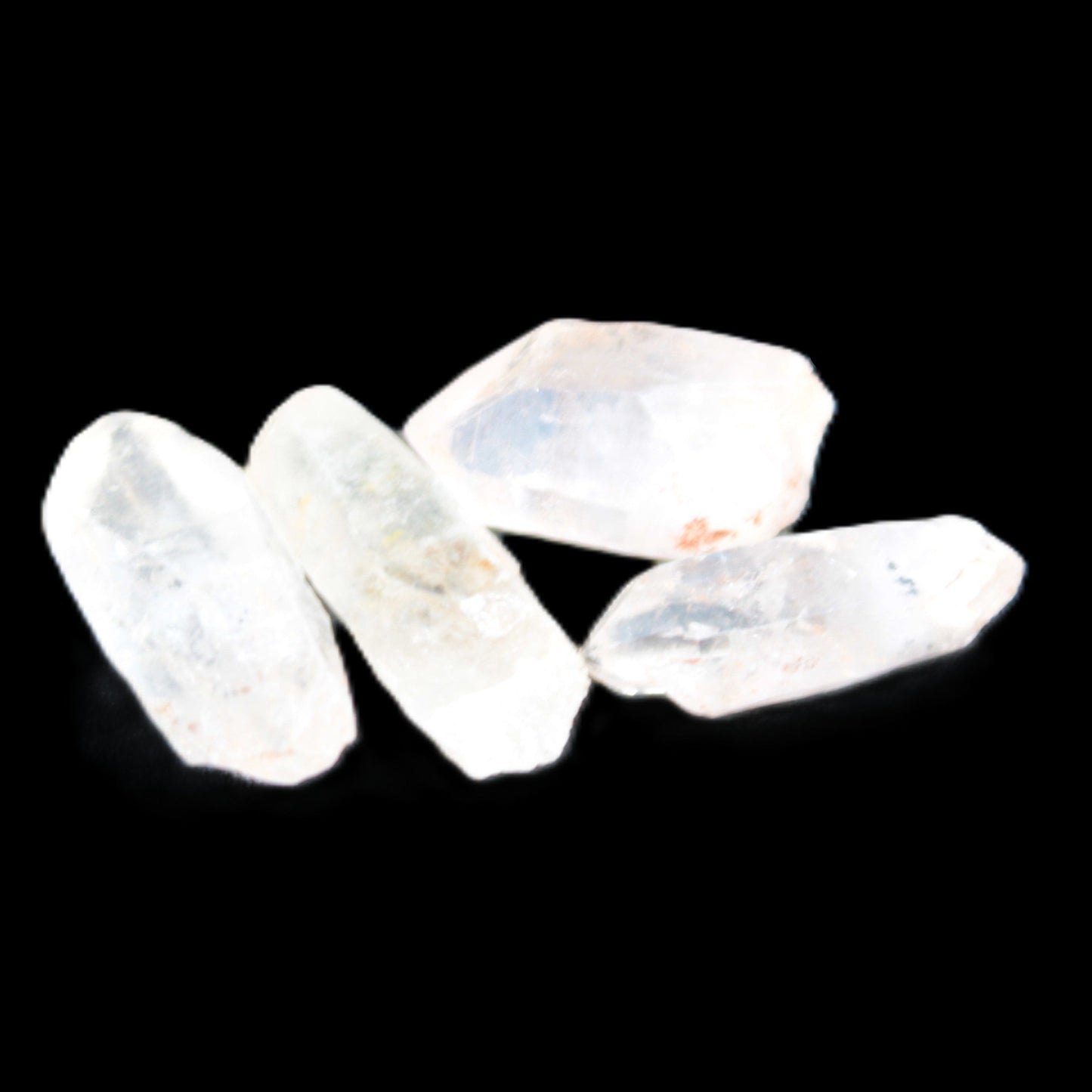 Fenster Enhydro Hydrocarbon 4 crystals 9-10g in sunlight - Rocks and Things Store