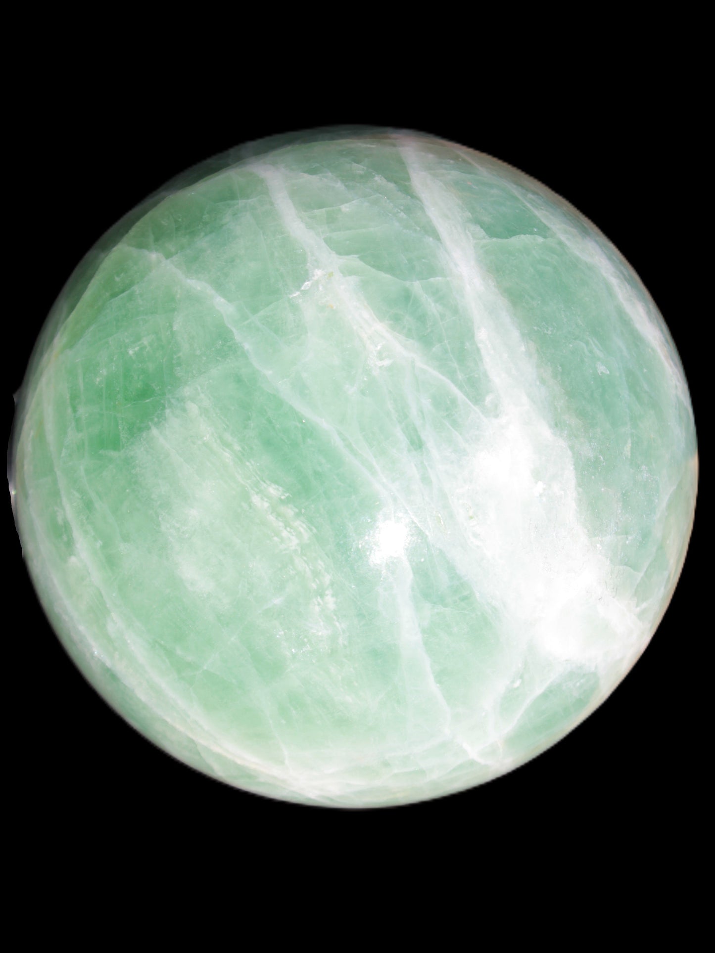 Green Fluorite sphere 108mm 2056g in sunlight - Rocks and Things Store