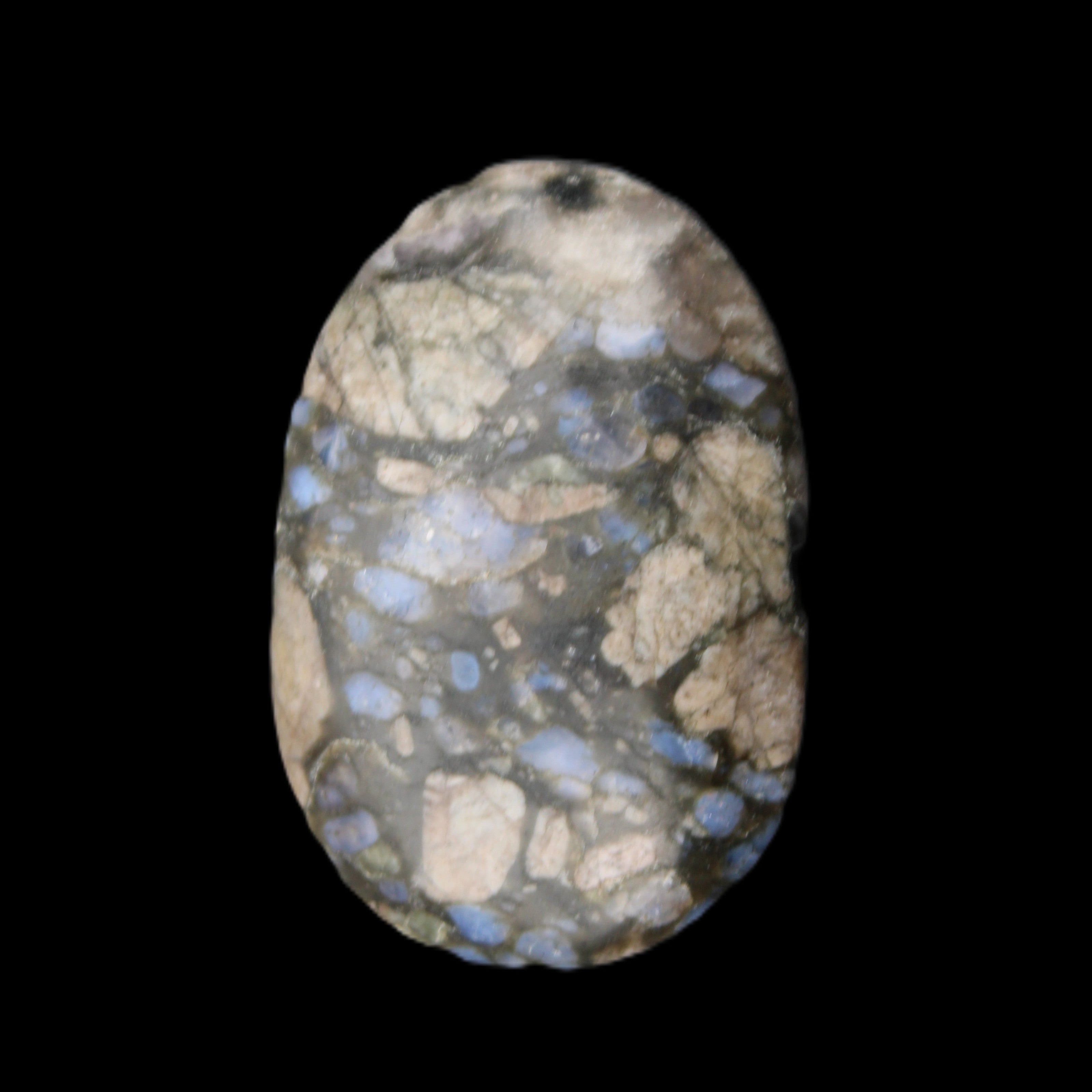 Llanite Que Sera palm stone 52*17*35mm 55g in sunlight - Rocks and Things Store