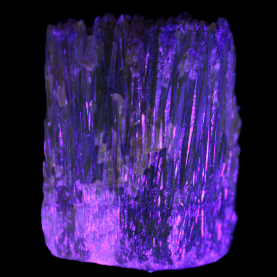 Amber Calcite phosphorescent crystal 127g in UV light -  Rocks and Things Store