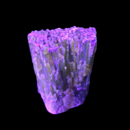 Amber Calcite phosphorescent crystal 127g in UV light - Rocks and Things Store