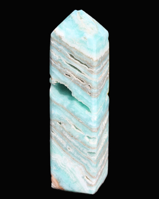 Aqua Blue Caribbean Calcite obelisk 292g in sunight - Rocks and Things Store