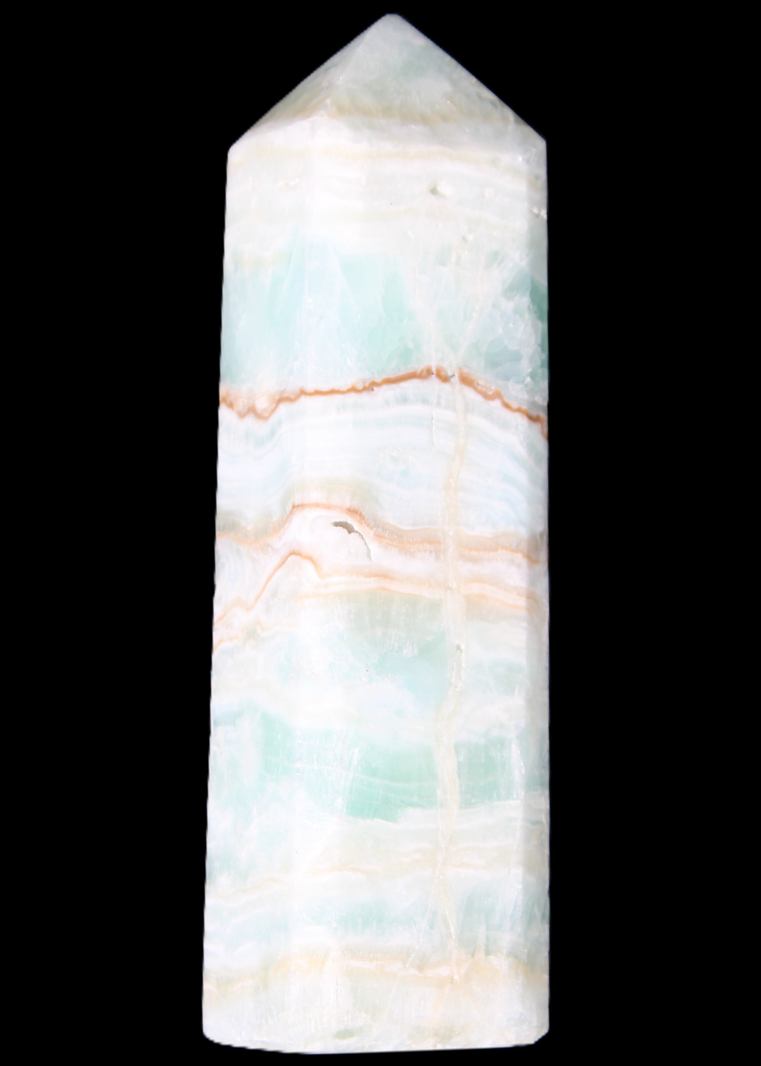 Pistachio Calcite obelisk 131*37*30mm 324g in sunlight - Rocks and Things Store