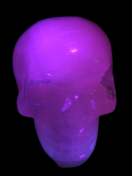 Mangano Calcite skull 40*55*45mm  160/161g in UV light - Rocks and Things Store