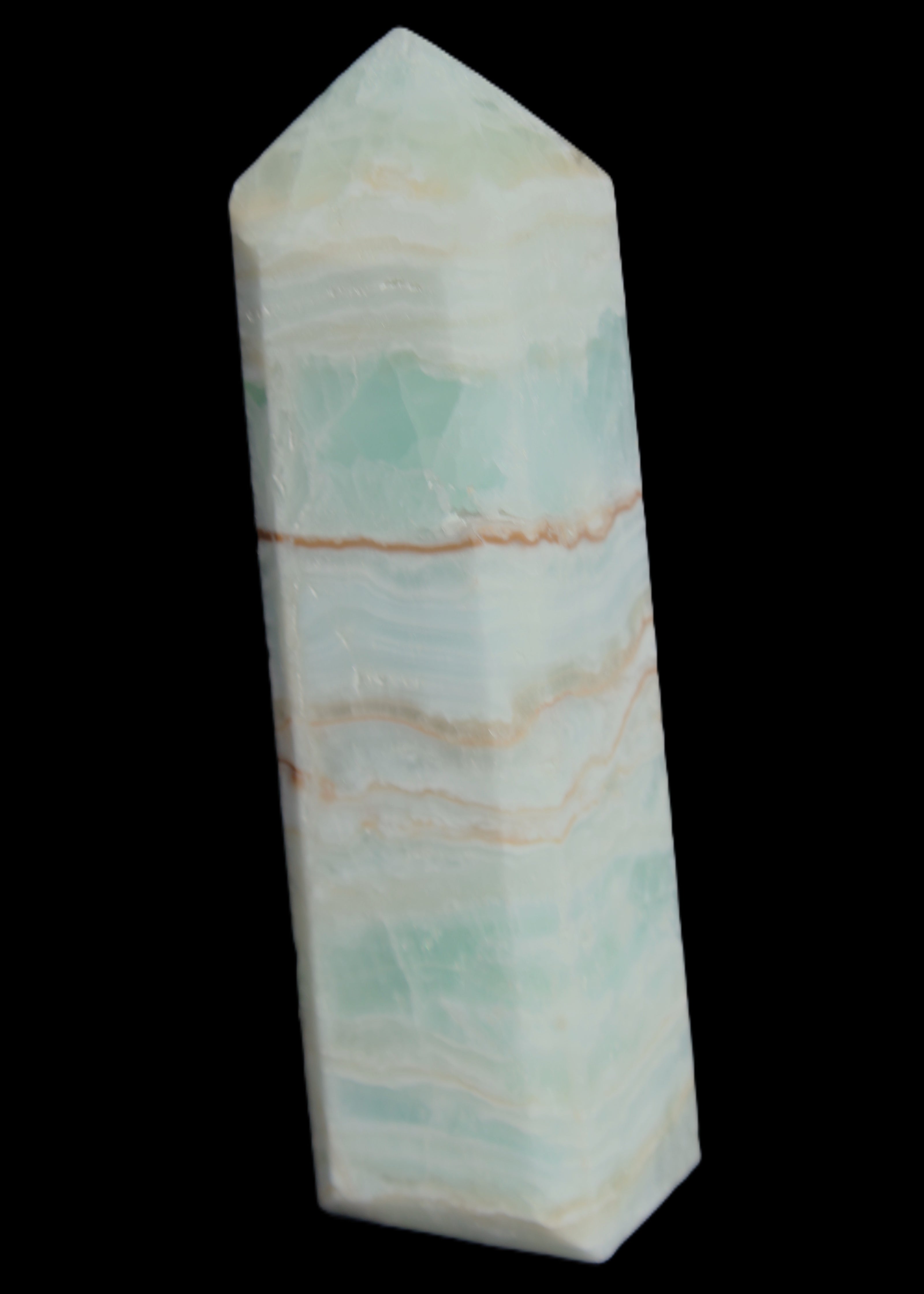 Pistachio Calcite obelisk 131*37*30mm 324g in sunlight - Rocks and Things Store