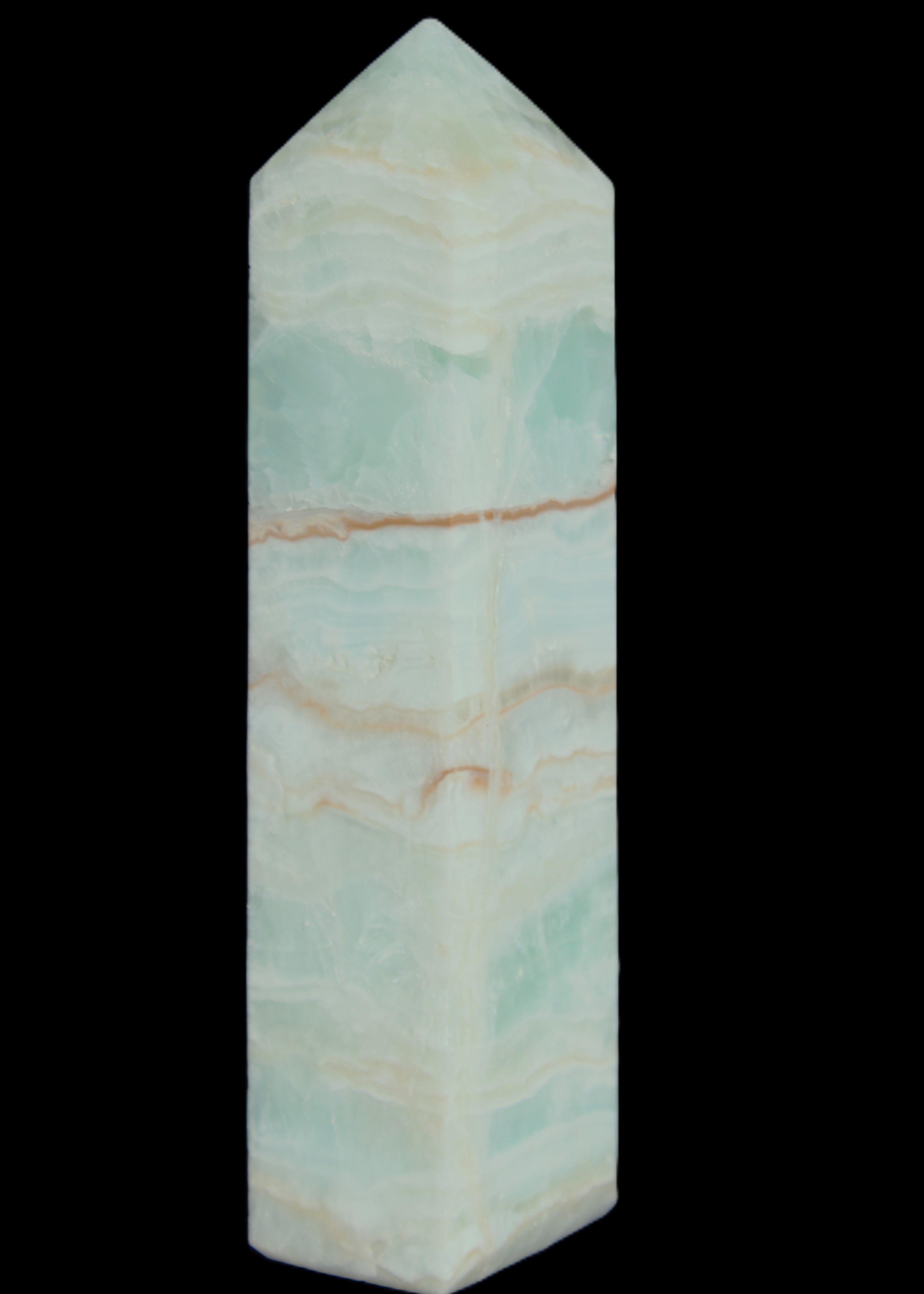 Pistachio Calcite obelisk 131*37*30mm 324g in sunlight - Rocks and Things Store