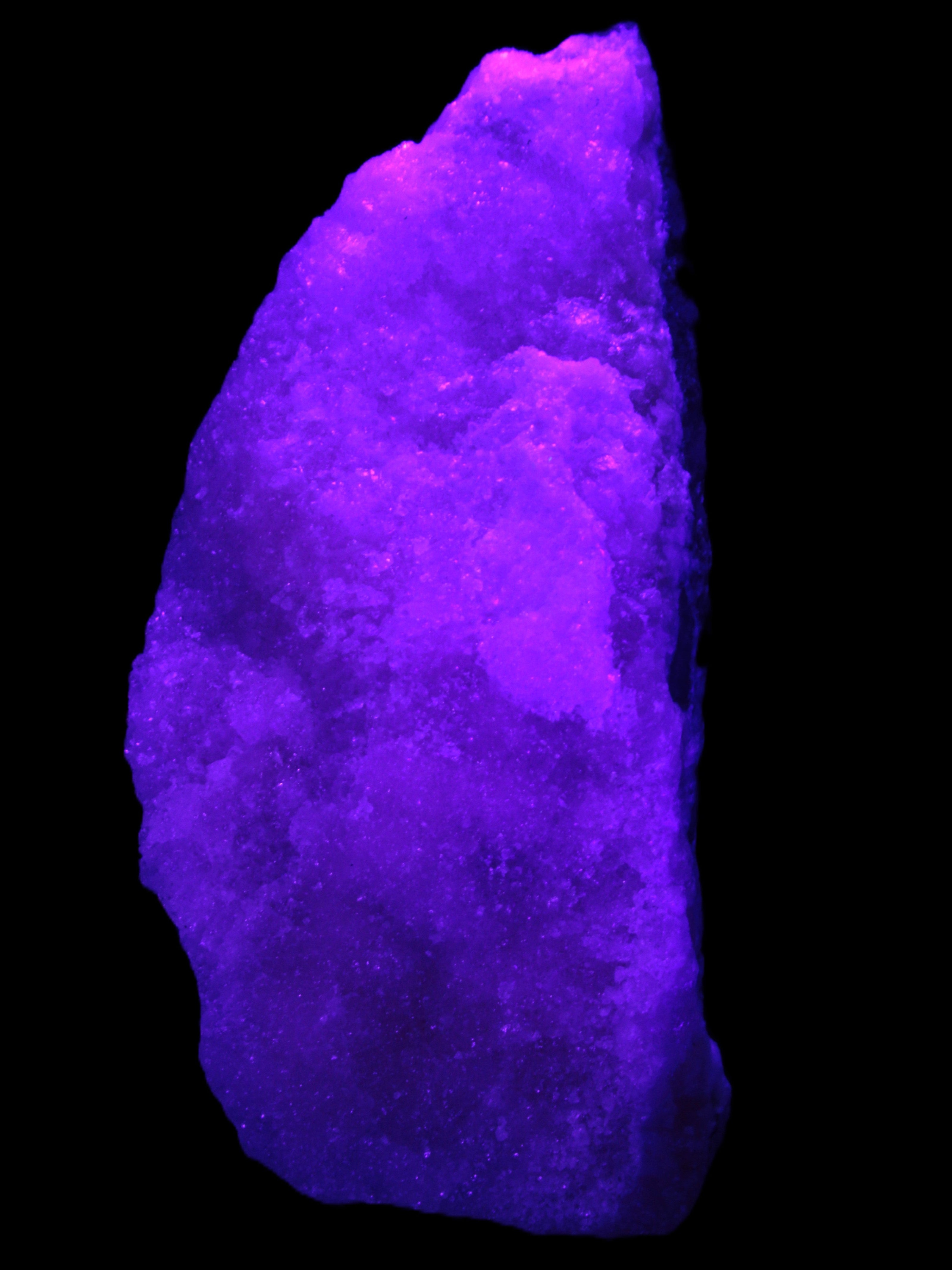 Pink Aragonite specimen on Ironstone matrix 150*22*75mm 336g in UV light -  Rocks and Things Store