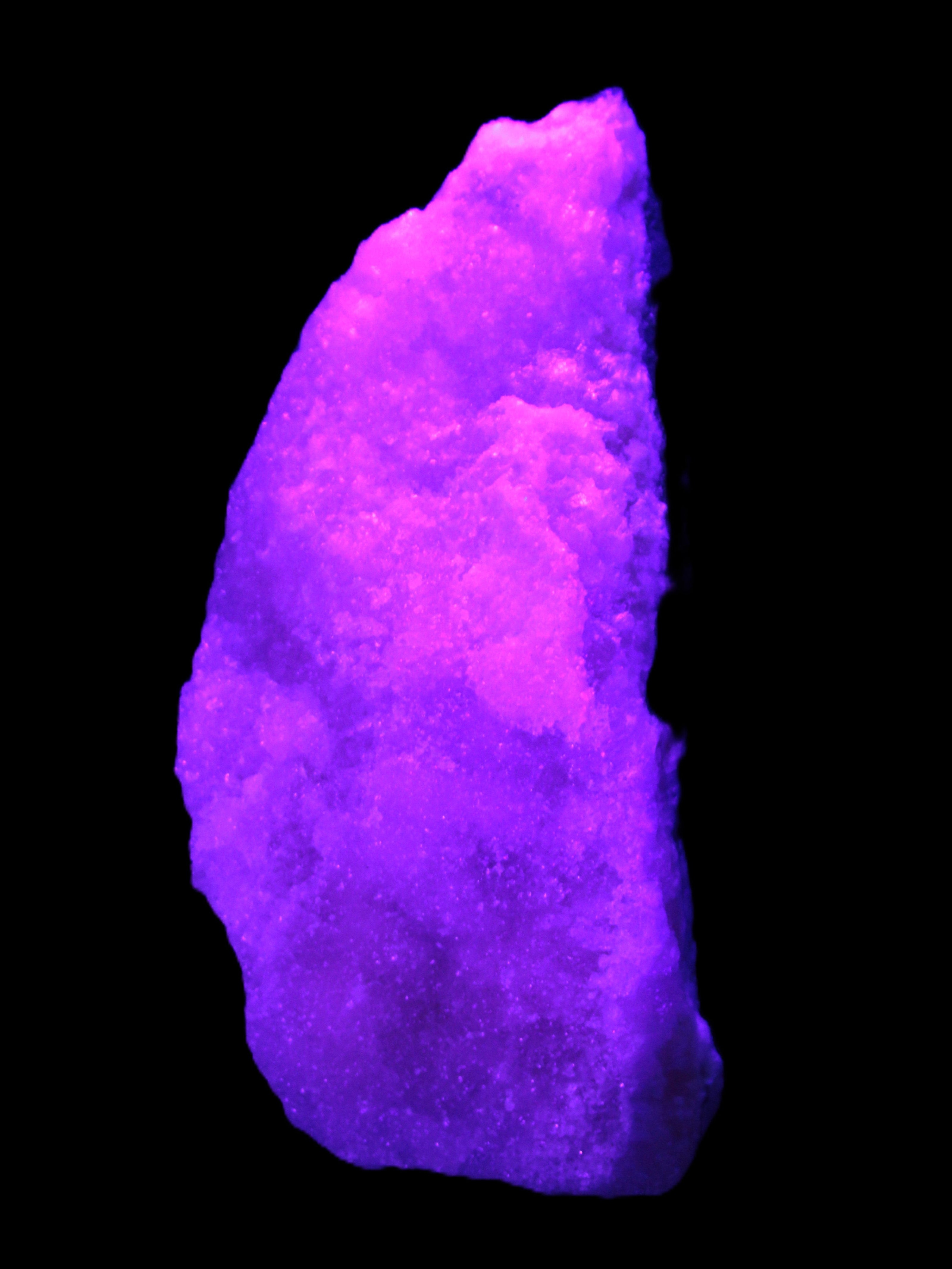 Pink Aragonite specimen on Ironstone matrix 150*22*75mm 336g in UV light -  Rocks and Things Store